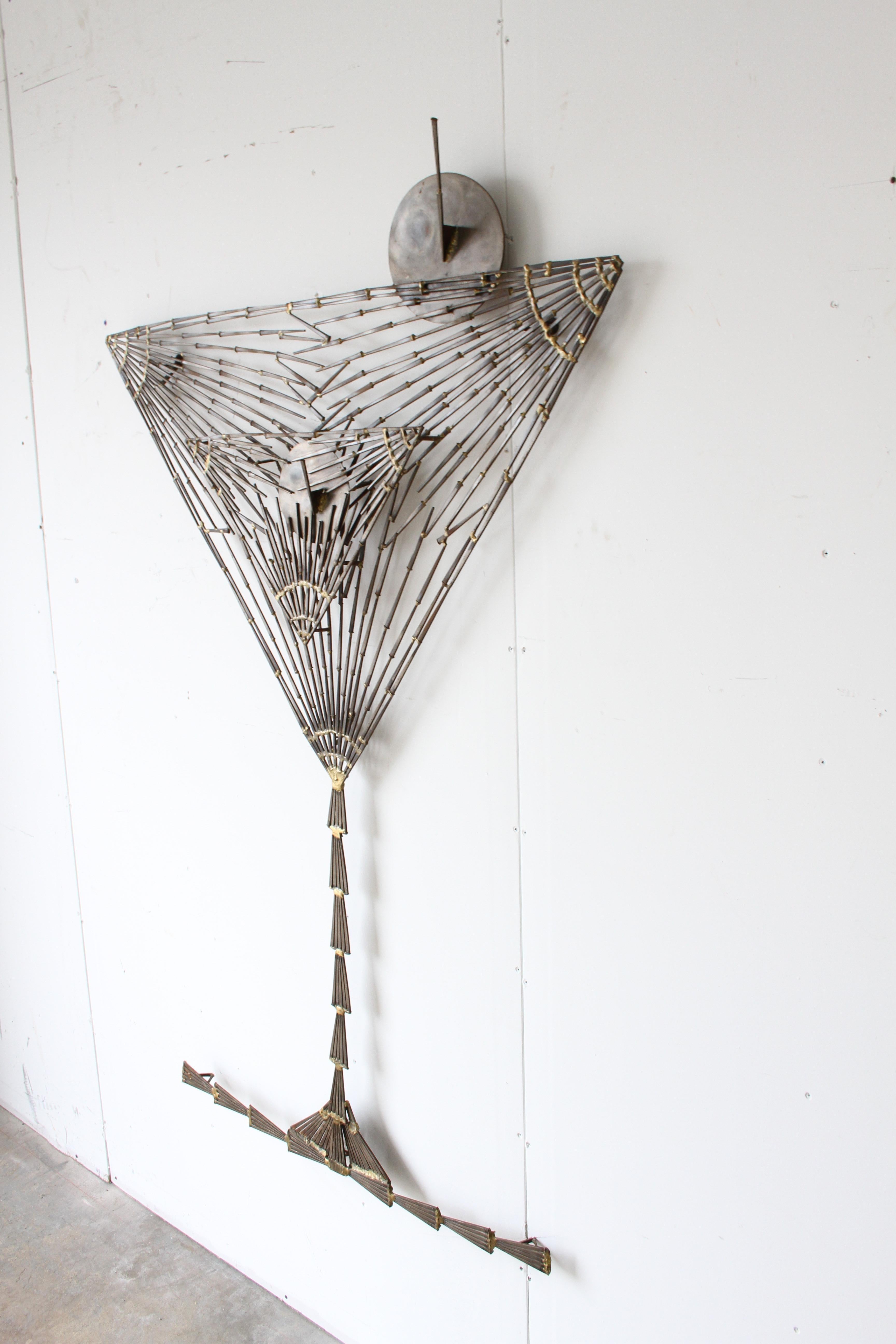 Very unique wall sculpture of a large martini glass with olives and ice made of nails in the Brutalist style by St. Louis artist Marc Weinstein, possibly a commission for a bar. Overall very nice condition, light patina, no breaks or loss. Marc