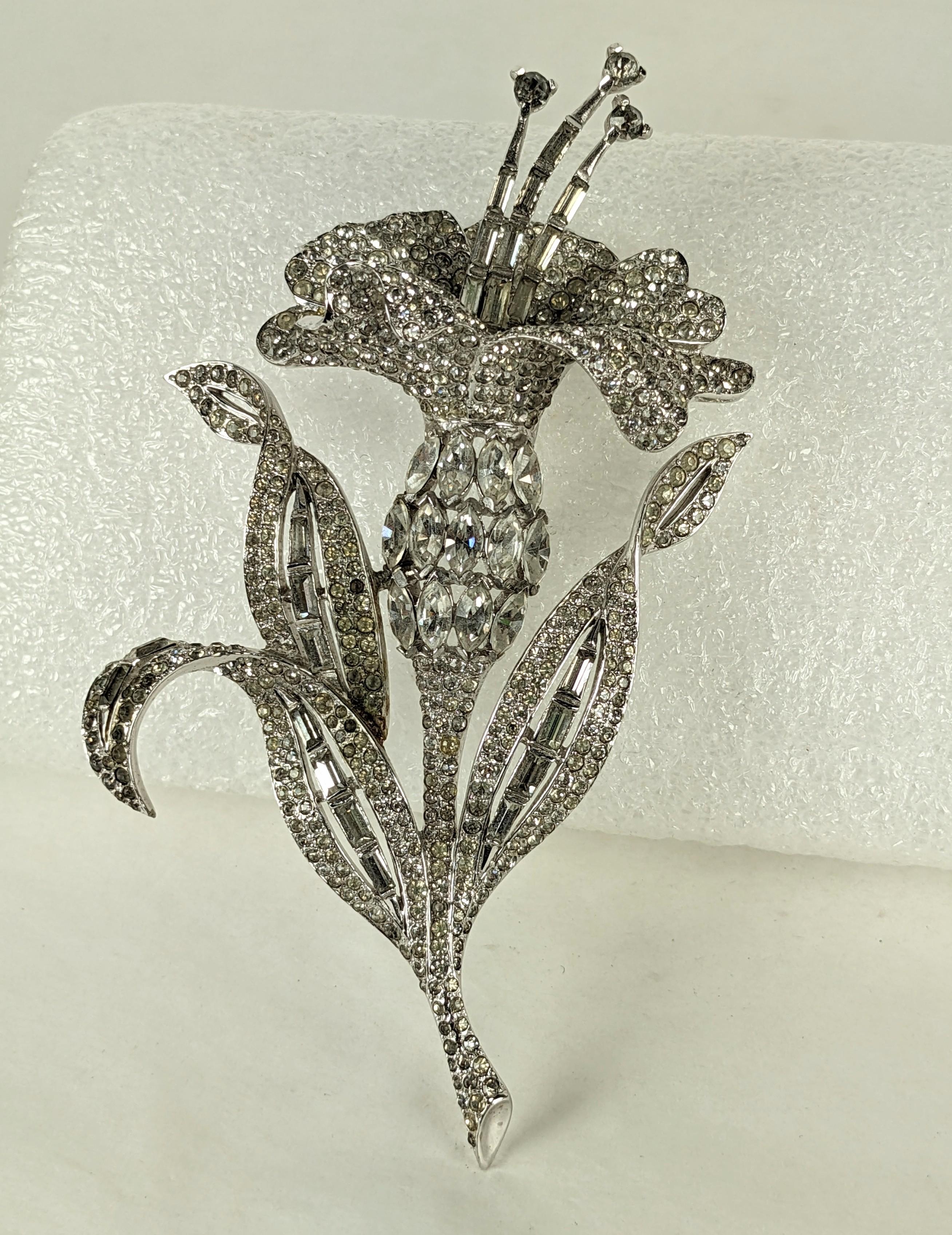 Rare and Massive Marcel Boucher Art Deco Pave Lily from the 1930's. High rhodium finish with pave rhinestones with round, baguette and navette stones. Extraordinary design from the late 1930's. Unsigned collectors piece. 1930's USA. 5