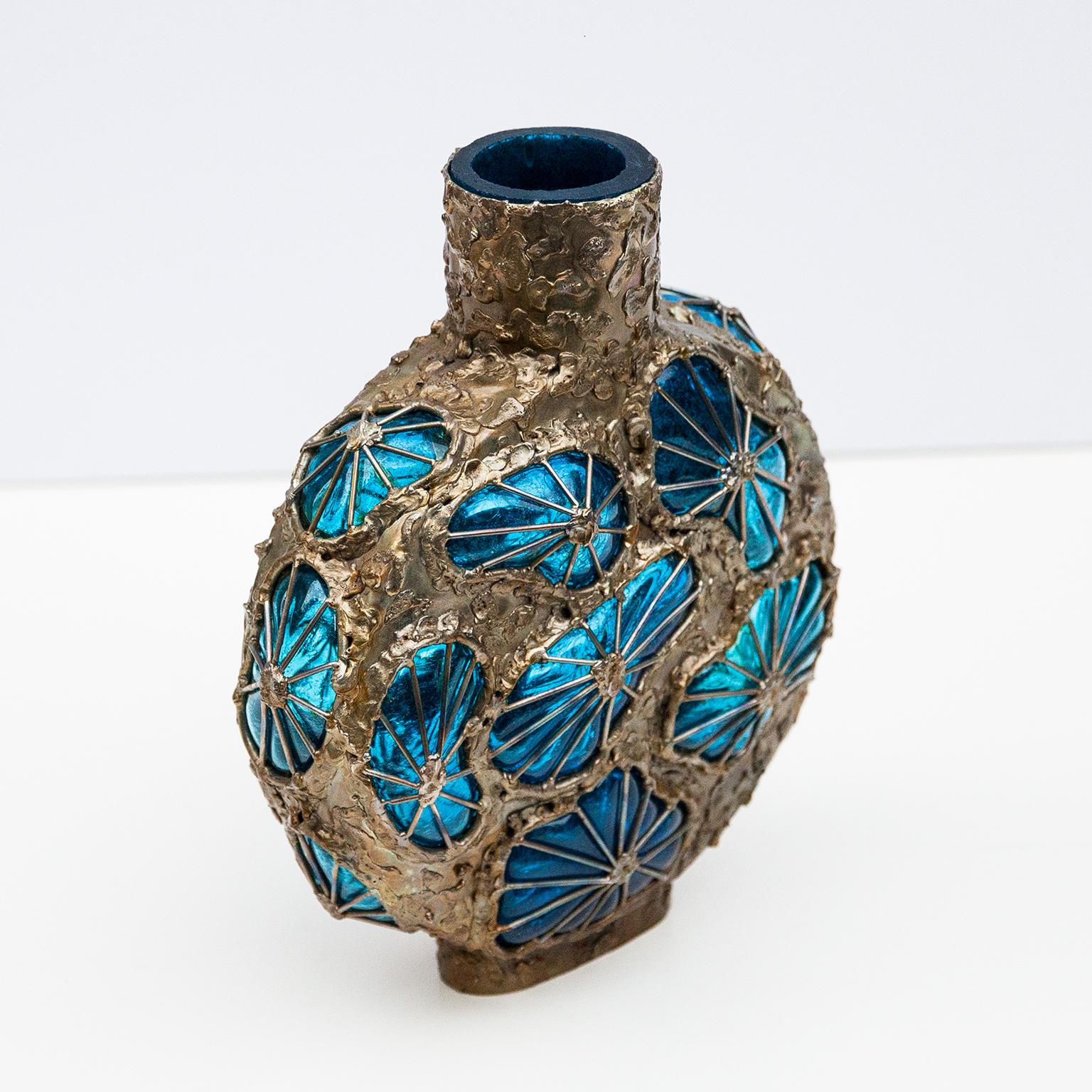 Marcello Fantoni and Gian Paolo blue blown glass and fused metal vase, having an organic form executed in blue glass with cold painted metal accents, signed on underside.