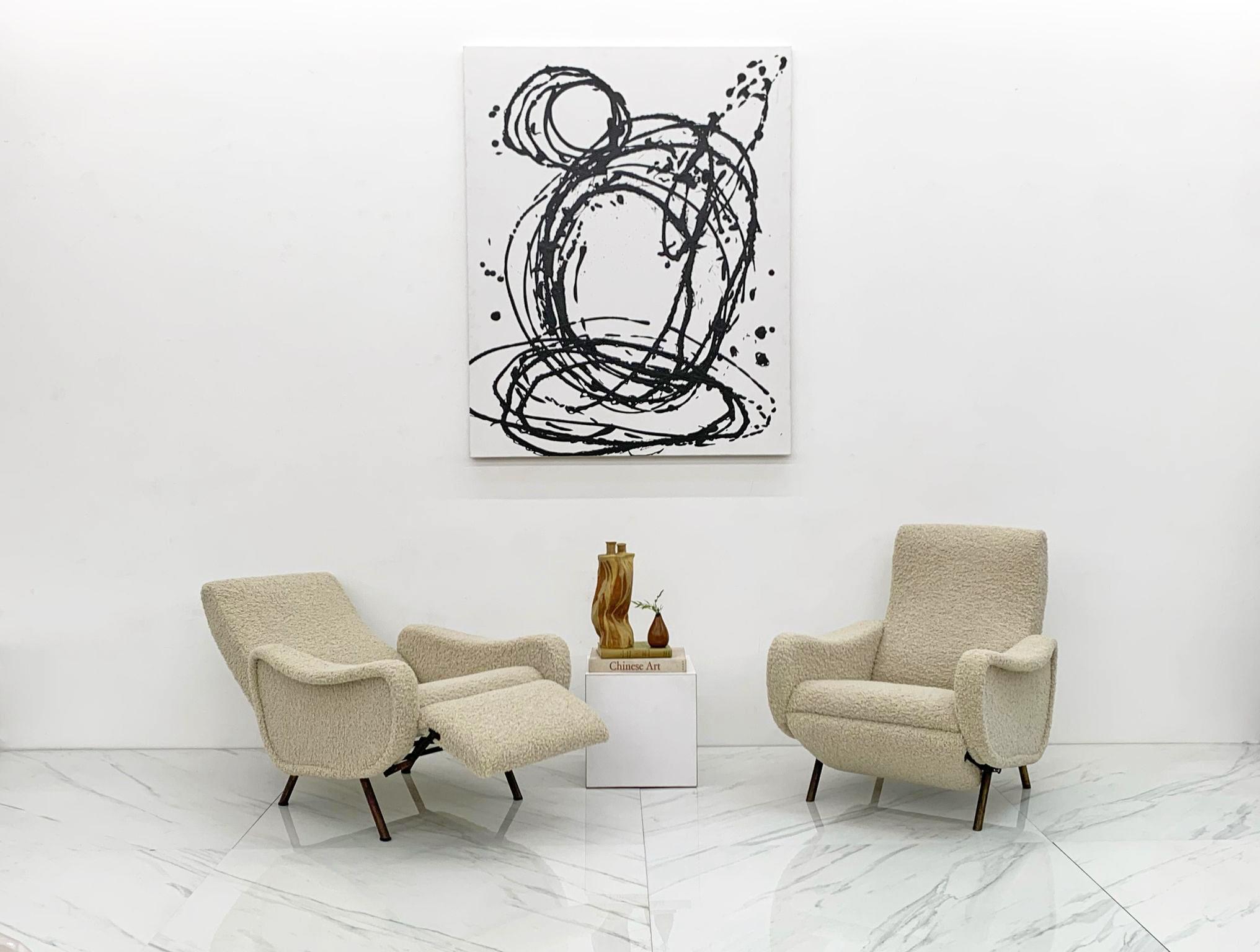 These chairs are absolutely stunning! A rare pair of Marco Zanuso reclining lady armchairs labelled Pizzetti Roma, these lady chairs are as timeless as it gets. Upholstered in a light teddy-bear tan boucle, these soft, curvy chairs are icons of mid