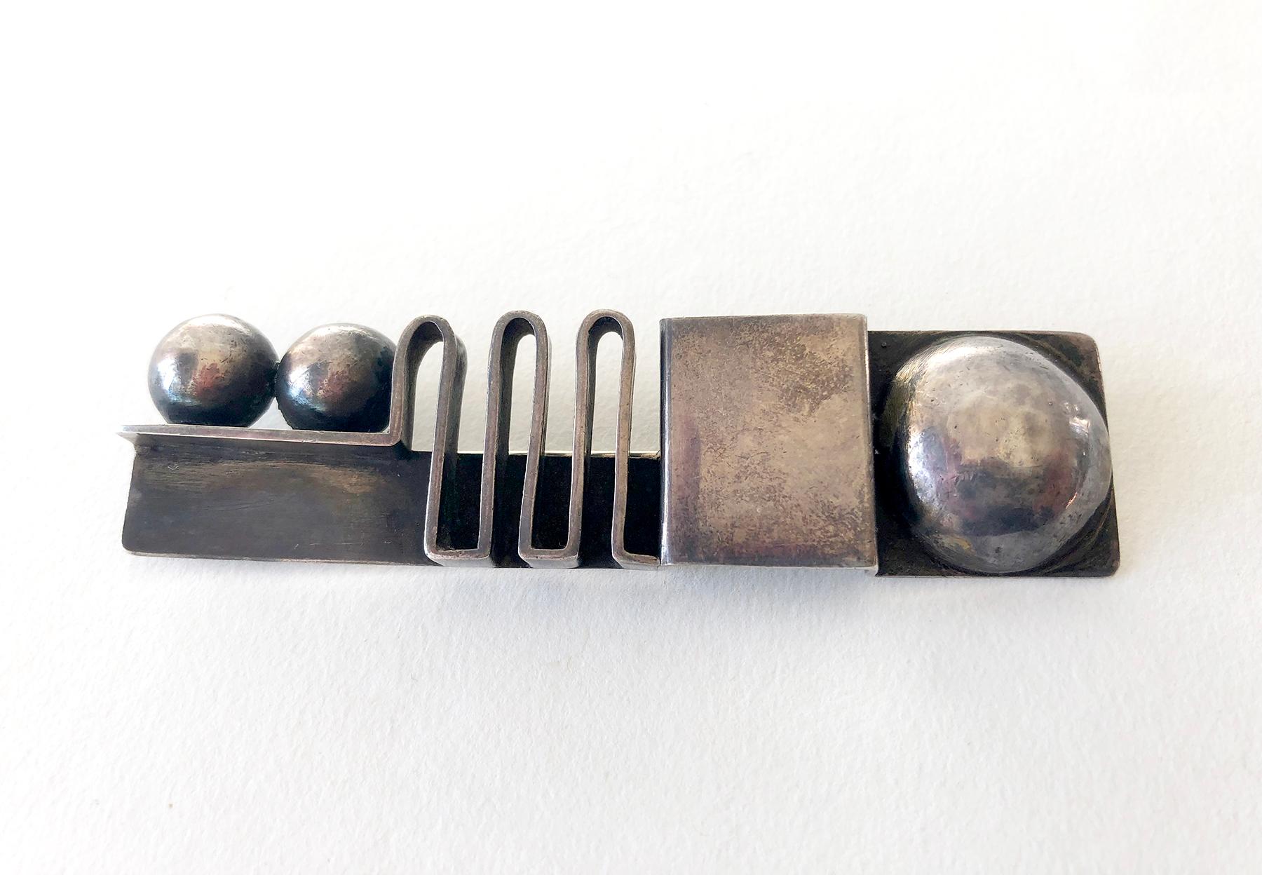 Early sterling silver brooch created by Margaret De Patta of San Francisco, circa late 1930's or so.  Brooch measures 5/8
