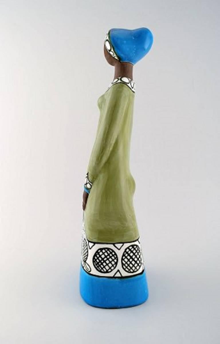 Rare Mari Simmulson figure of woman, ceramics, Upsala-Ekeby.
Measures: Height 42 cm, width 12.5 cm.
In perfect condition.
Stamped.