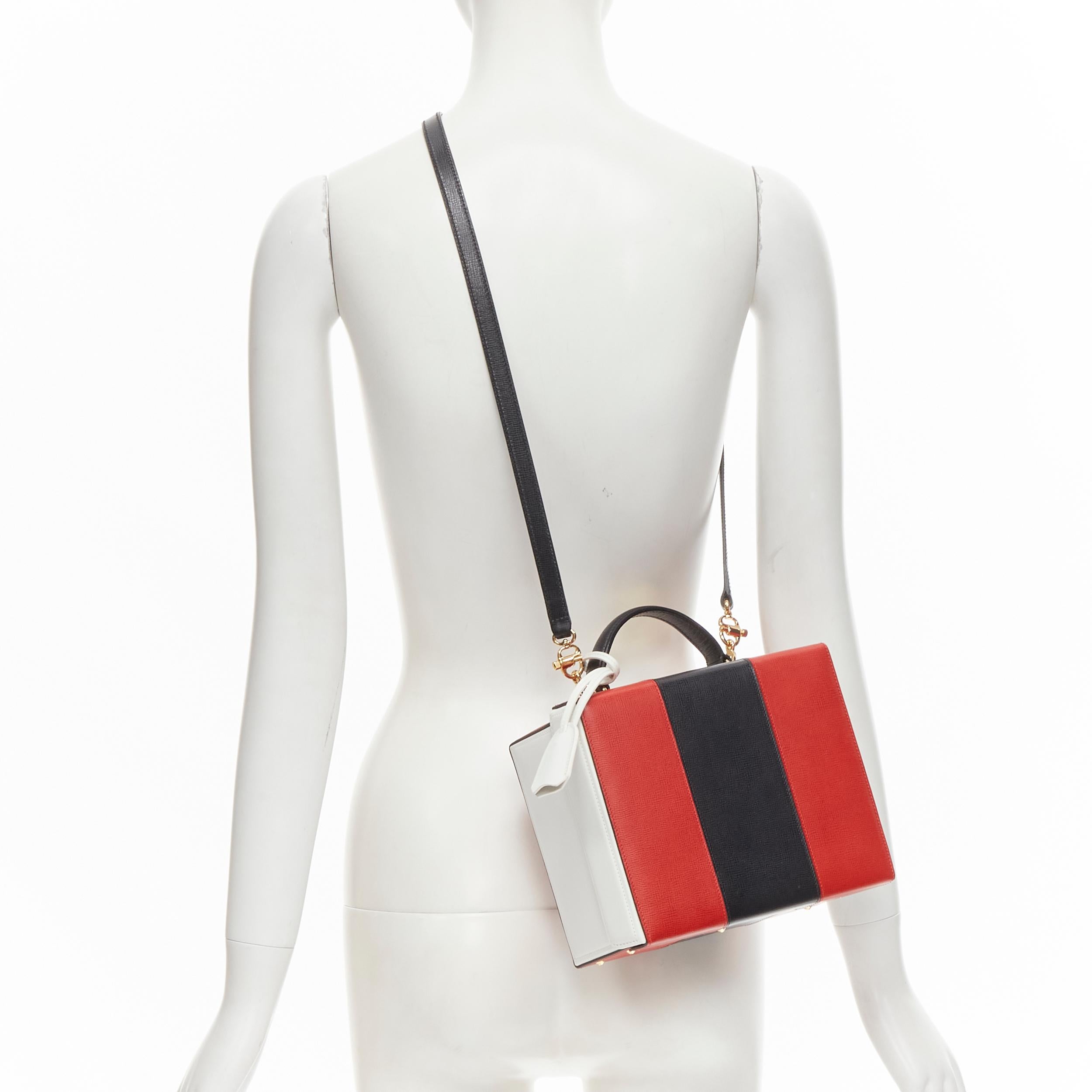 rare MARK CROSS Grace Large red black white leather crossbody vanity box bag 
Reference: SNKO/A00166 
Brand: Mark Cross 
Model: Grace 
Material: Leather 
Color: Red 
Pattern: Solid 
Closure: Clasp 
Extra Detail: Gold-tone hardware. 
Made in: Italy