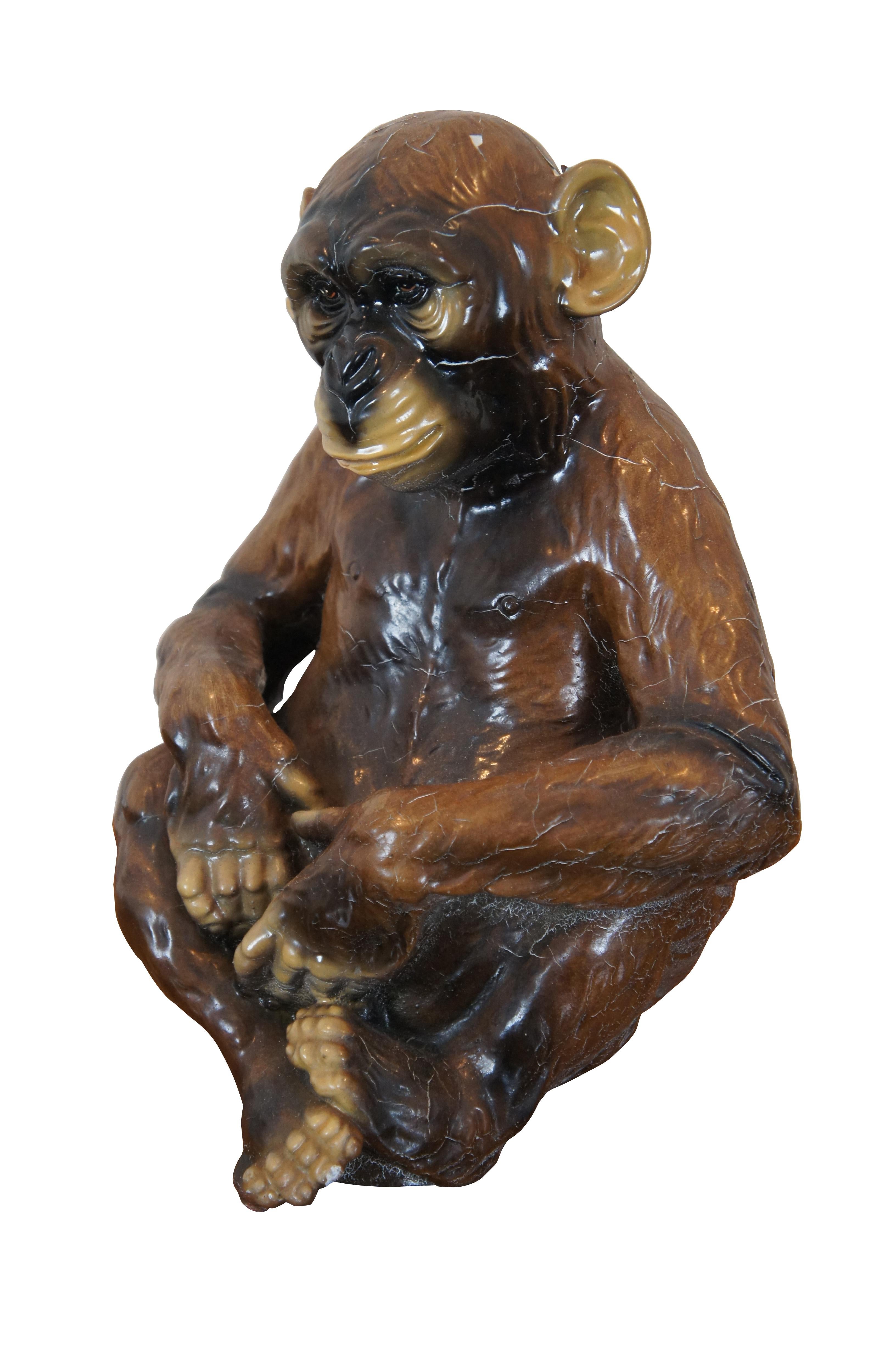 Rare vintage figurine / statue of a seated brown primate / ape / chimpanzee by Marwal Industries Inc, crafted of chalkware with a glossy lacquer finish.

