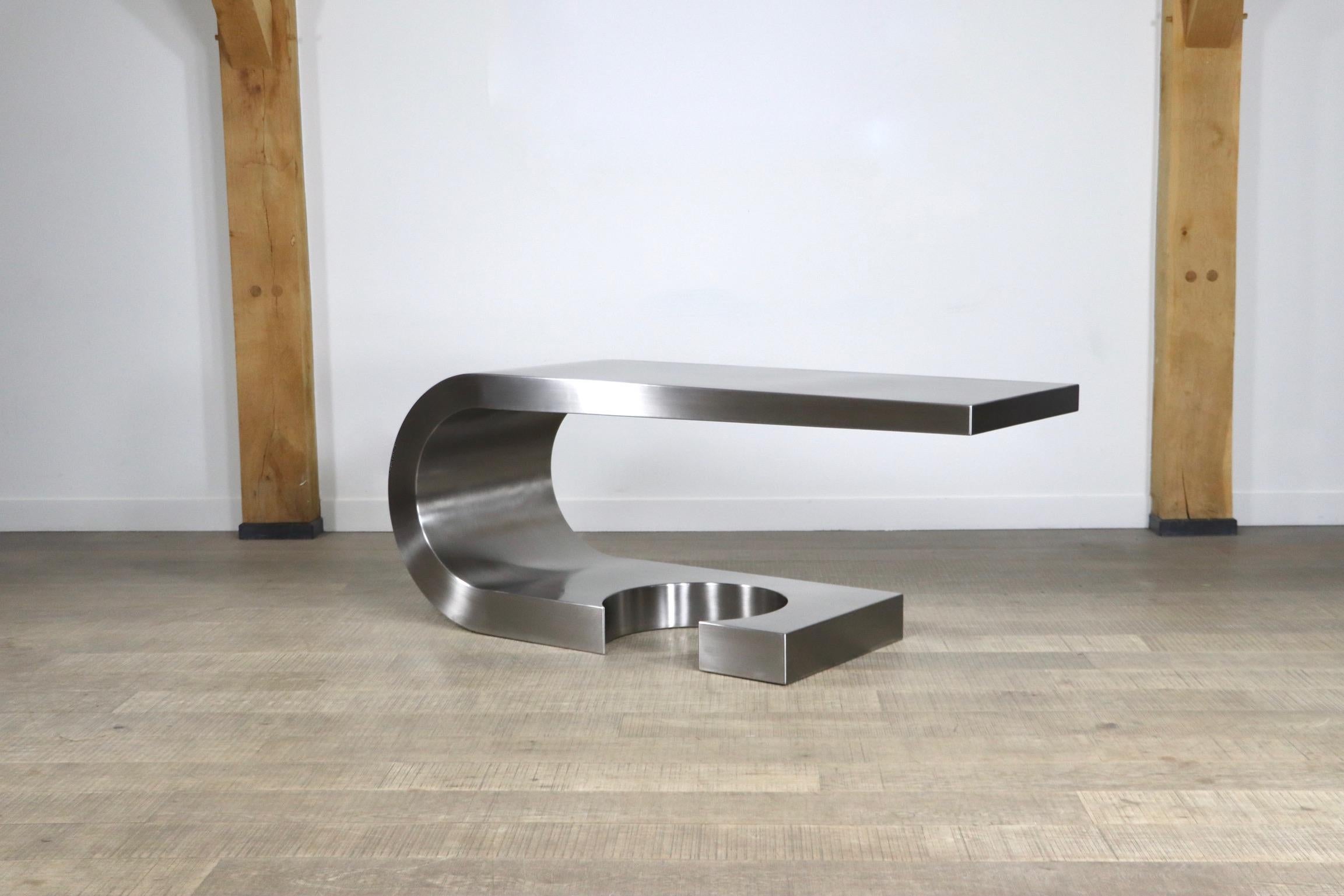 Stunning stainless steel cantilever desk model Diapason, designed by Marzio Cecchi for Studio Most Firenze in the 1970s. 
The exceptional high quality bent stainless steel with cutout base will give any space a prominent and luxurious feeling. This