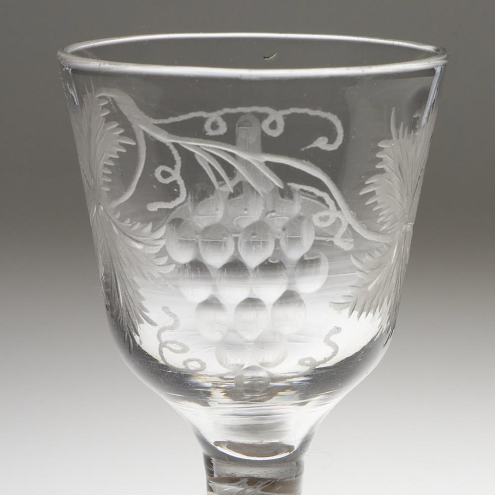 Heading : Masonic engraved opaque twist stem Georgian ale glass
Period : George II / George III - c1760
Origin : England
Colour : Clear
Bowl : Round funnel, engraved with a fruiting vine and a level - the jewel of office of the Senior Warden of a