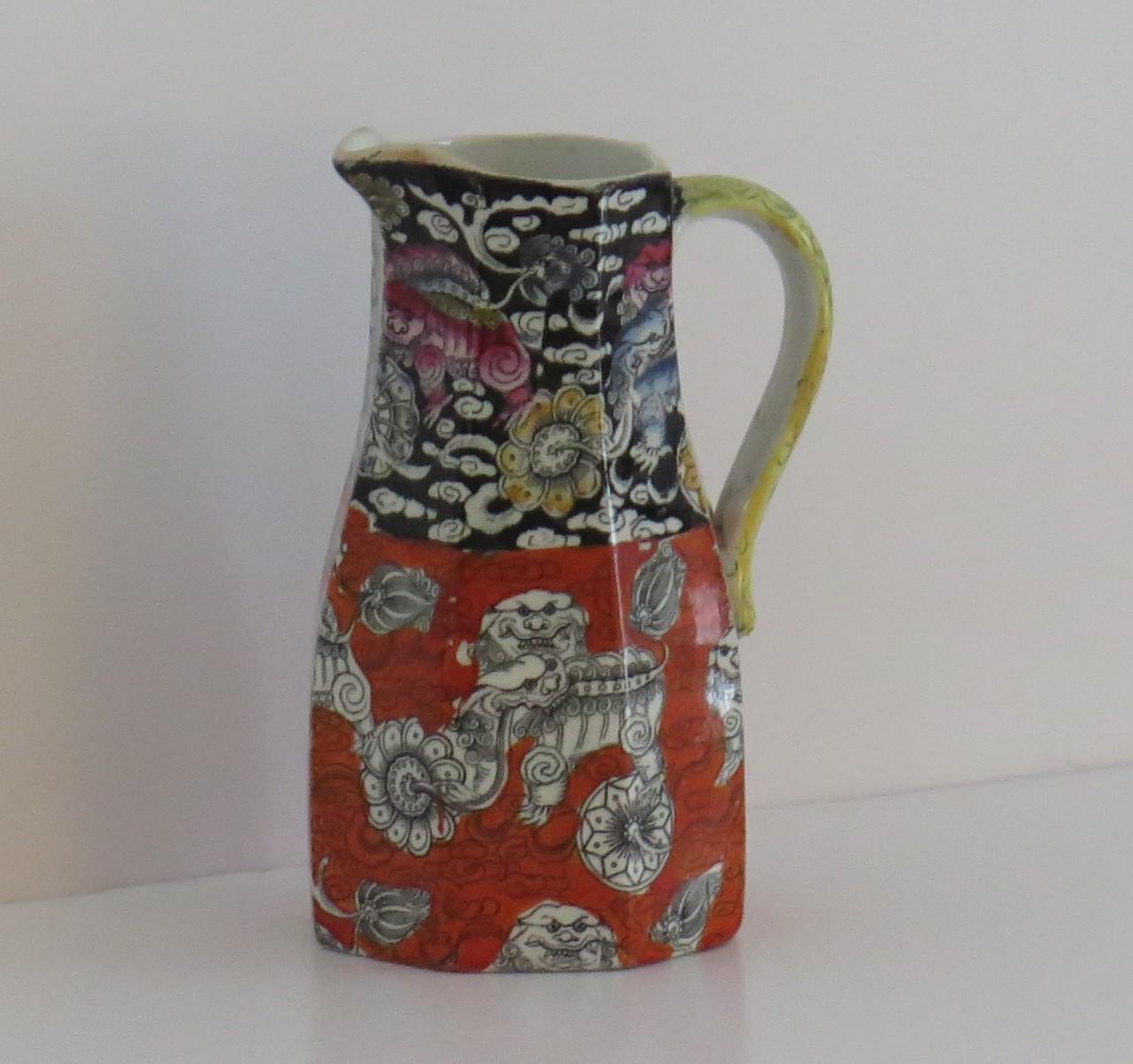 This is a rare shape jug made by Mason's Ironstone pottery. 

The jug is decorated with the chinoiserie influenced 