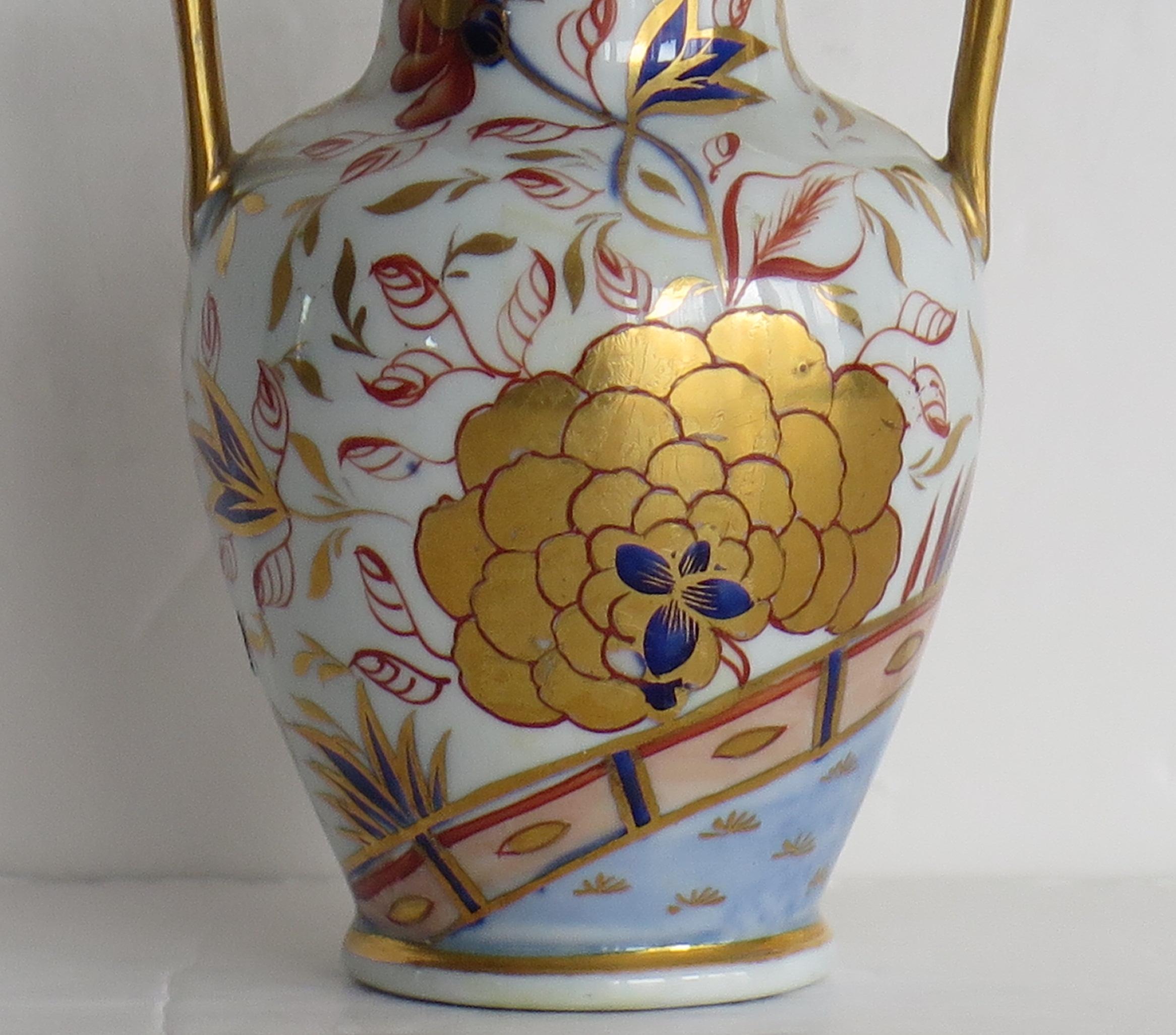 This is a rare miniature Mason's ironstone Lidded Urn or Vase in the beautiful Gold Rose Japan pattern, which we date to circa 1820.

Miniature or toy items of Masons ironstone are hard to find today.

This piece is well potted as a baluster