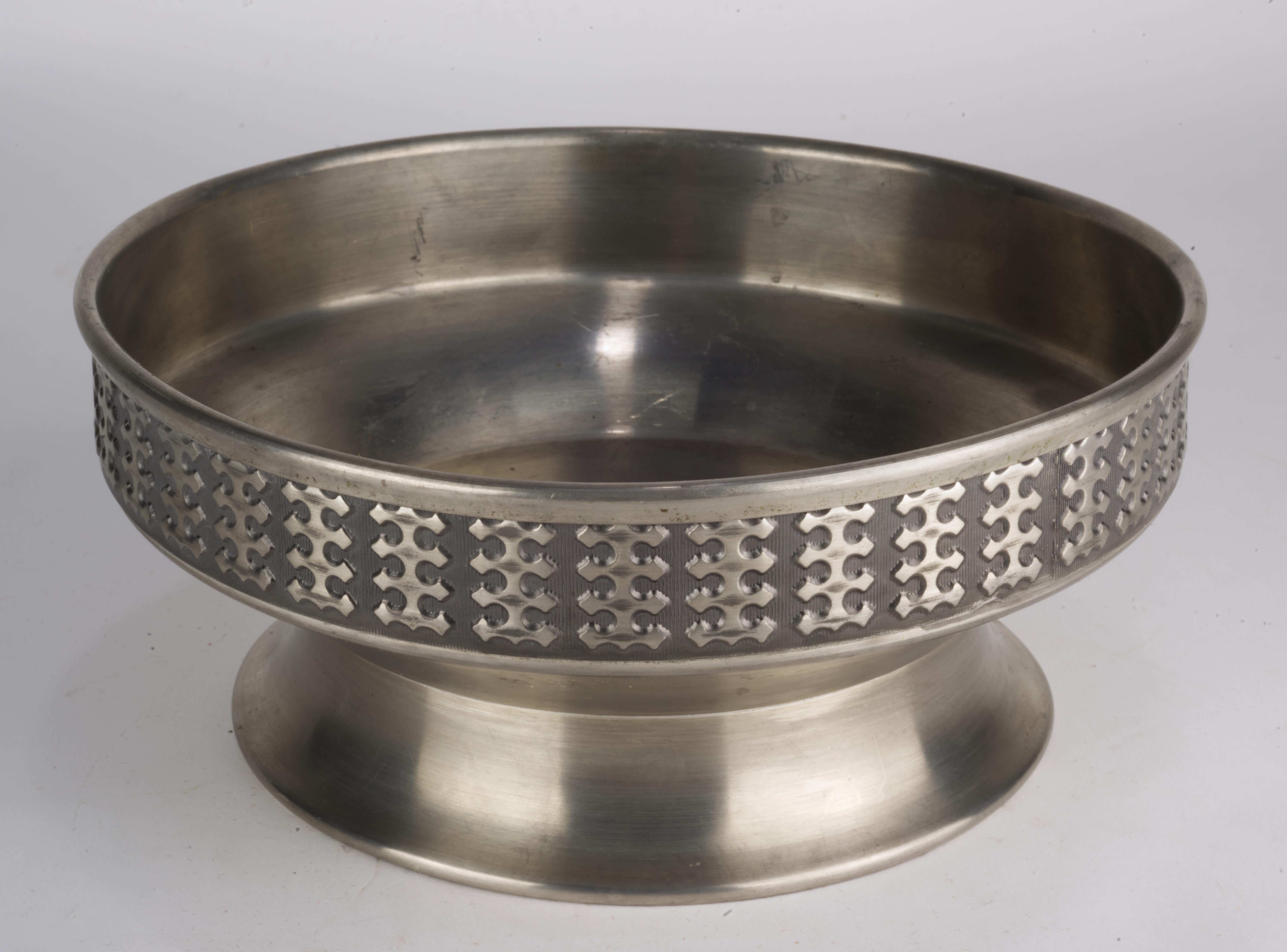  Rare Mastad Norway Footed Bowl in Scandinavian Midcentury Modern style was made by Mastad Norway in 1950s. It has wide, stable base, patterned sides, and is signed with manufacturer's logo on the bottom. It's in a good condition with light wear