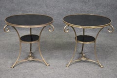 Rara coppia di gueridoni francesi di grandi dimensioni in bronzo massiccio e granito nero