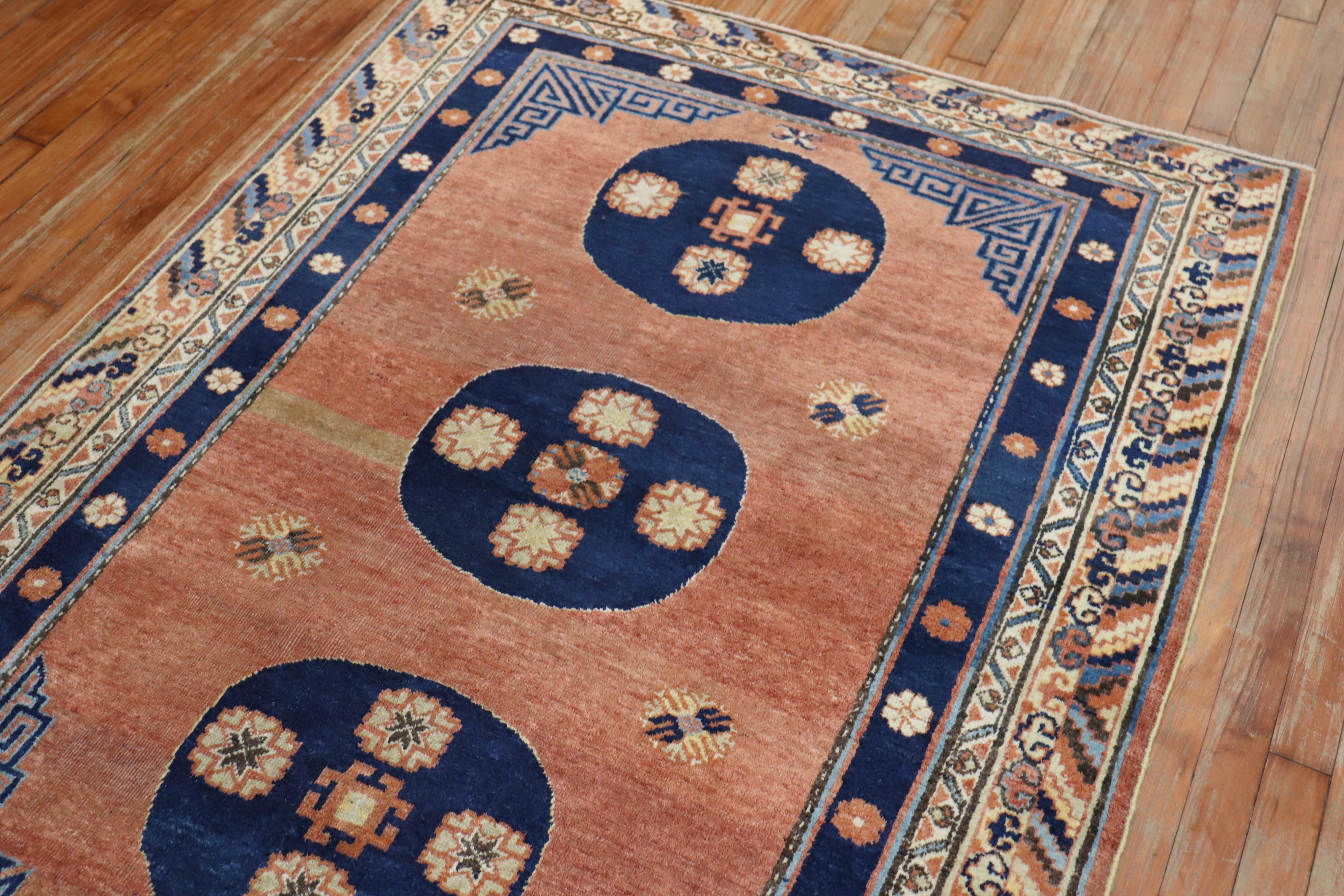 Wool Rare Matching Pair of Antique Khotan Carpets For Sale