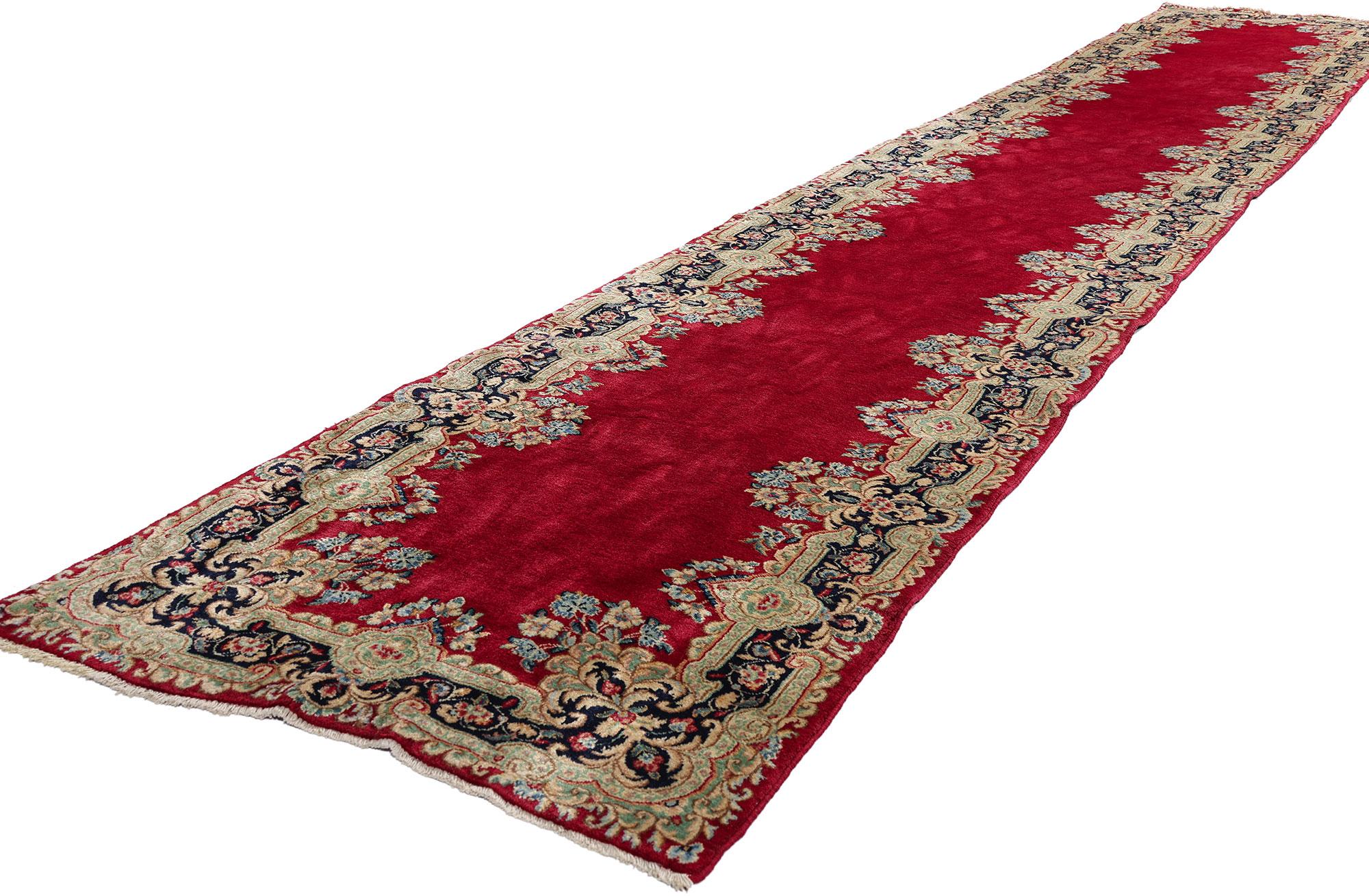 90031-90032 Rare Matching Pair Antique Red Persian Kerman Rug Runner, 02'07 x 16'04. Immersed in a world of curated refinement and aristocratic allure, this one-of-a-kind hand-knotted wool antique Persian Kerman rug runner is a masterclass in elite