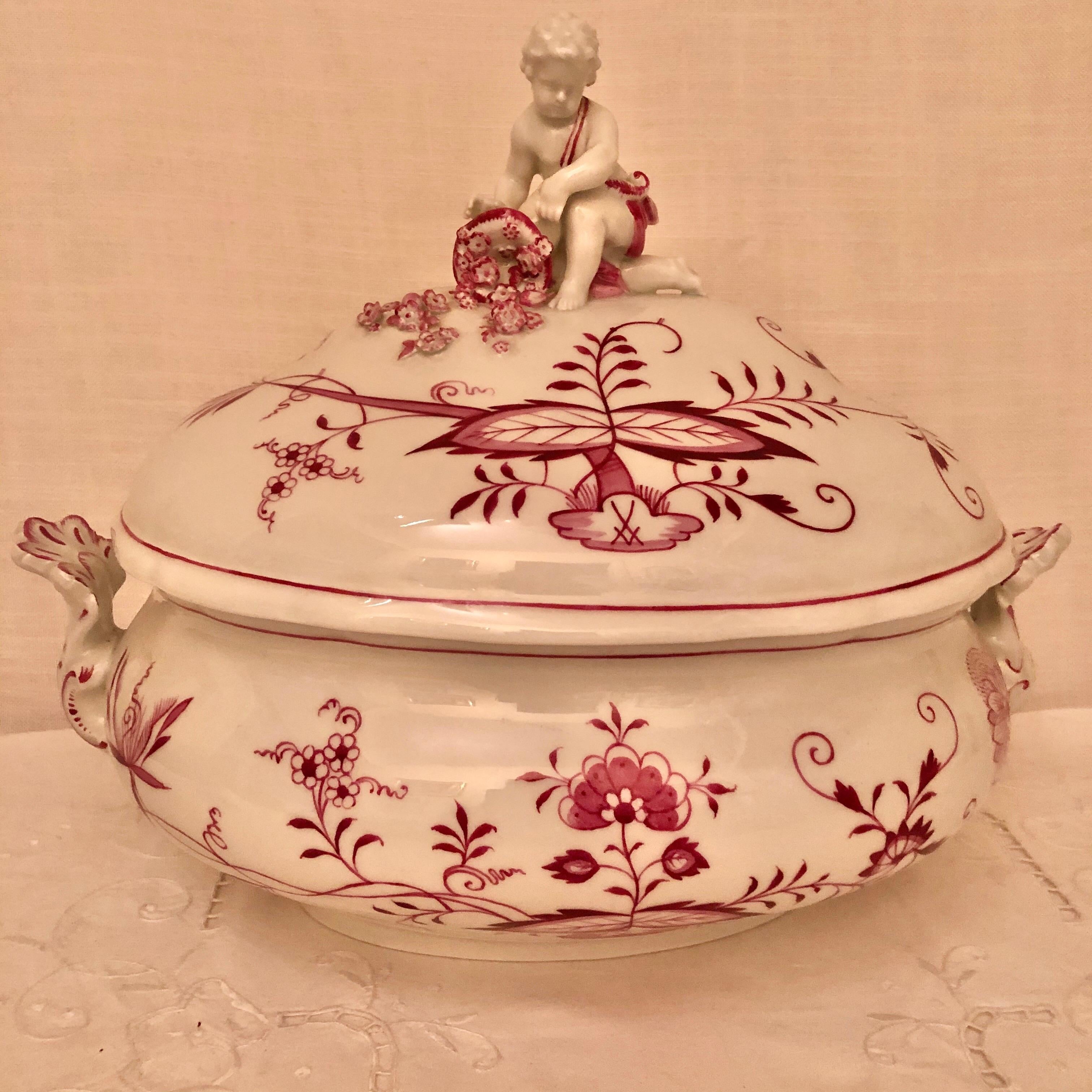 We are proud to offer you this rare Meissen pink onion dinner service having 66 pieces. It is essentially a service for twelve with many serving pieces. However, we only have 11 cups and saucers. Over the past thirty years, I have only seen one