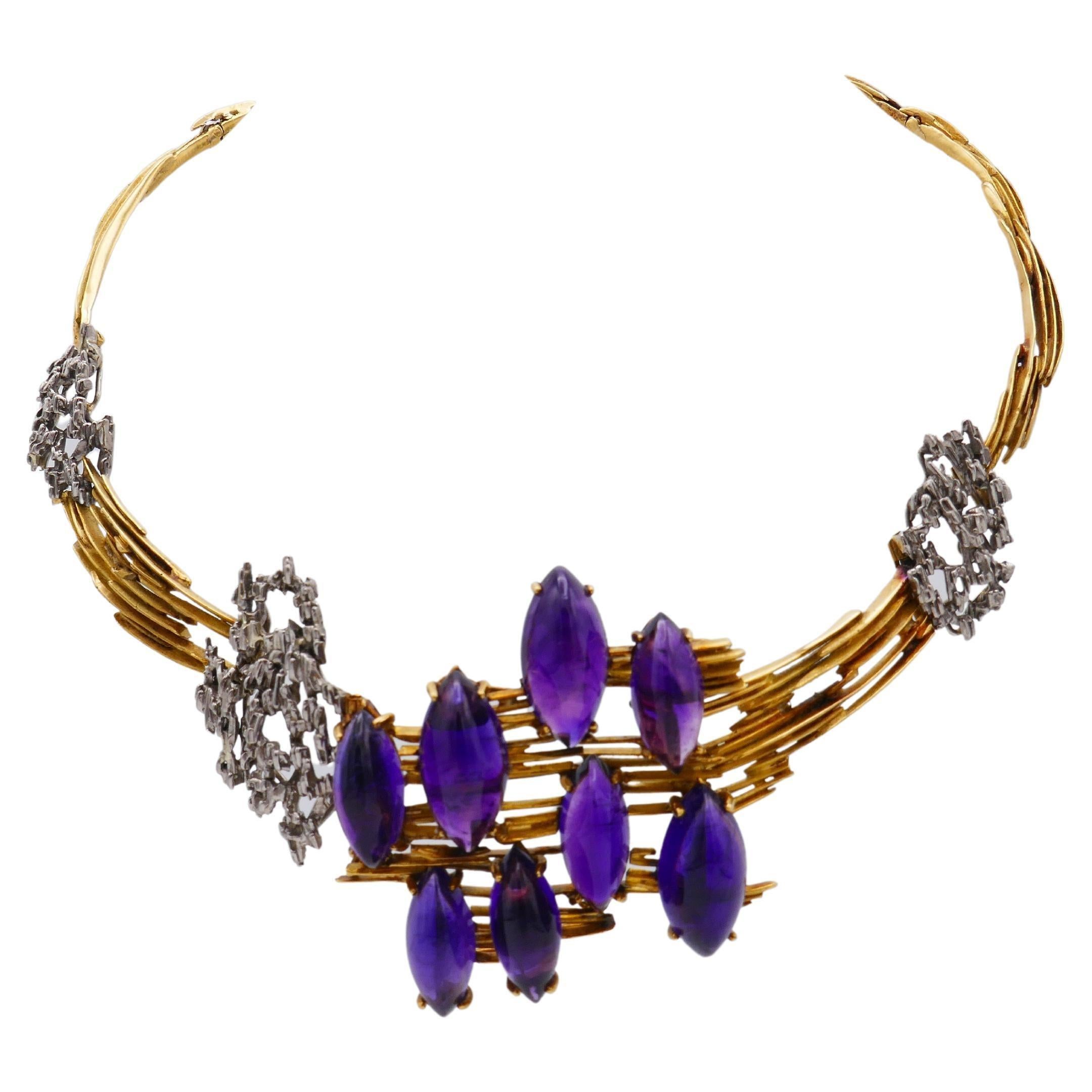 A rare creation by Mellerio, an openwork two-tone gold necklace features eight cabochon amethysts. Comprised of the moving parts connected by hinges for flexibility. Its distinctive architectural look makes a great conversation piece. 
Measurements: