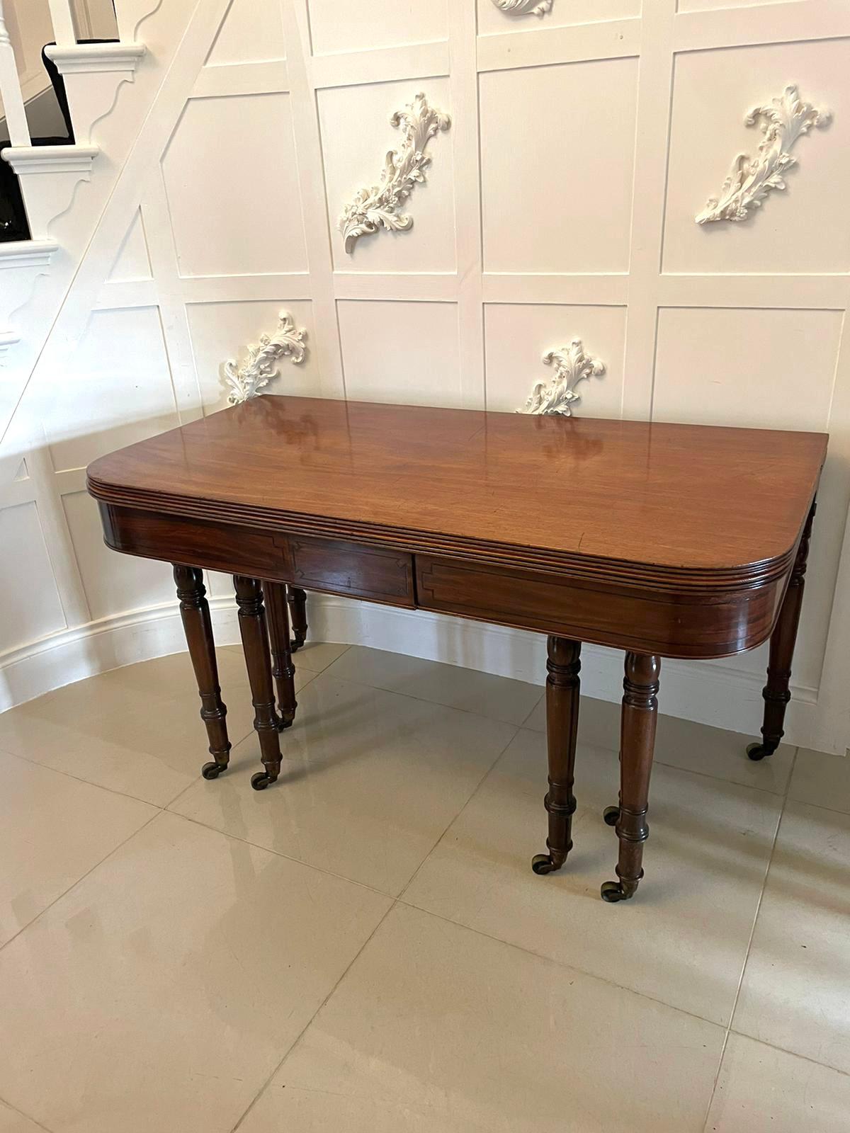 Rare table de salle à manger à rallonge de qualité George III en acajou métamorphique en vente 11