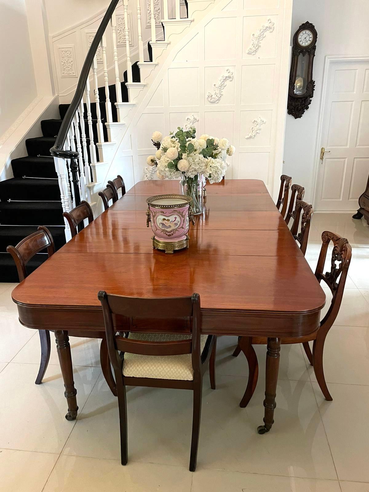 Rare metamorphic antique George III quality mahogany extending dining table having a quality mahogany top with a reeded edge and 3 original extra leaves standing on 8 turned tapering mahogany legs with original brass castors

This fabulous table