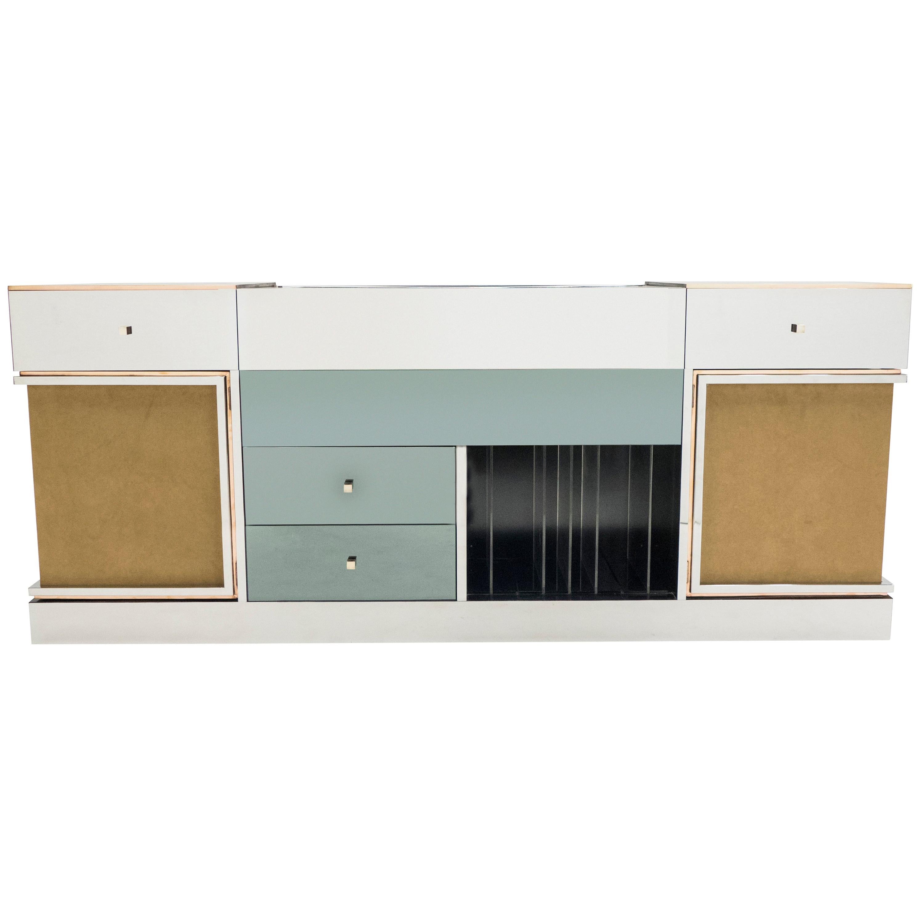 Rare and unique French Mid-Century Modern sideboard by Michel Pigneres made circa 1969. The sideboard, which was custom made with hifi equipment features, is an exquisite example of refined, highly detailed and very well made furniture. The mirrored