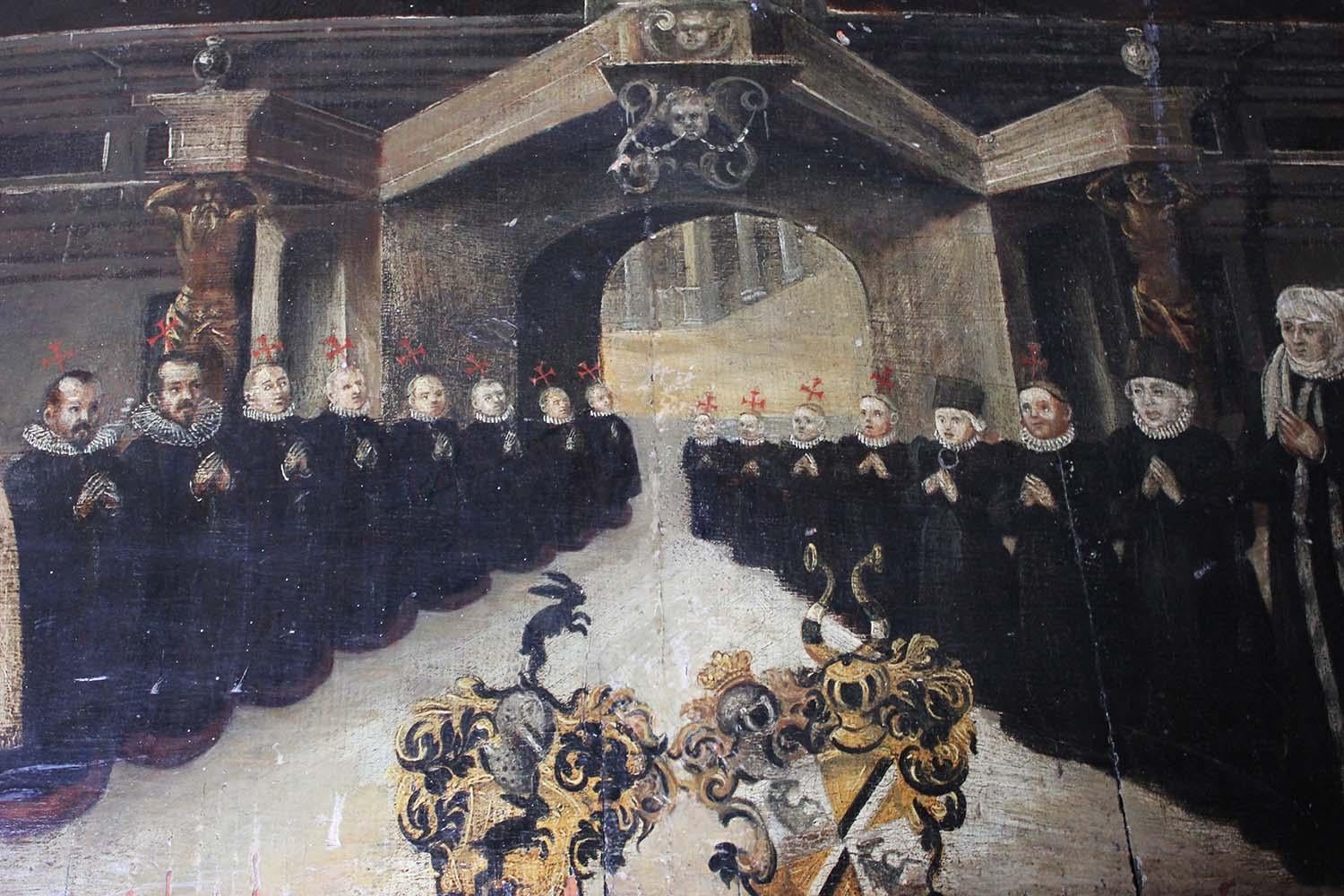The atmospheric work in oils on one inch thick panel, made for the family chapel or altar, of good size and in memory of a Patrician family, the symmetrical composition showing seventeen males and females, with the two respective coats of arms