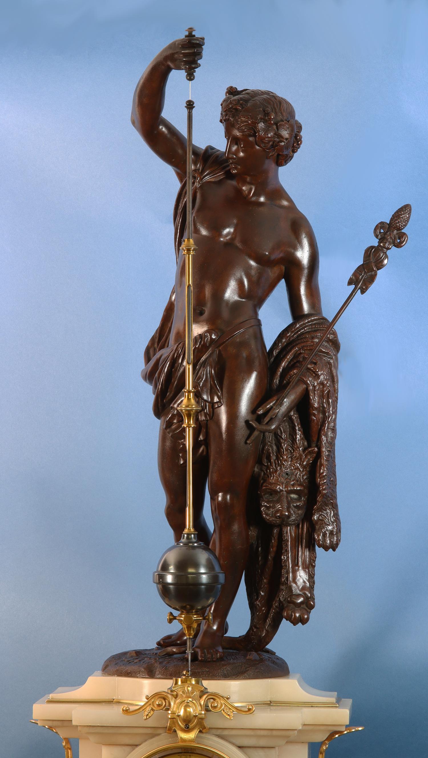 A beautiful mid-19th century French conical clock with a patinated metal figure of Jason holding the golden fleece. 

The decorative alabaster case is adorned with gilt bronze mounts and supports a large patinated figure of Jason. 
The pendulum is
