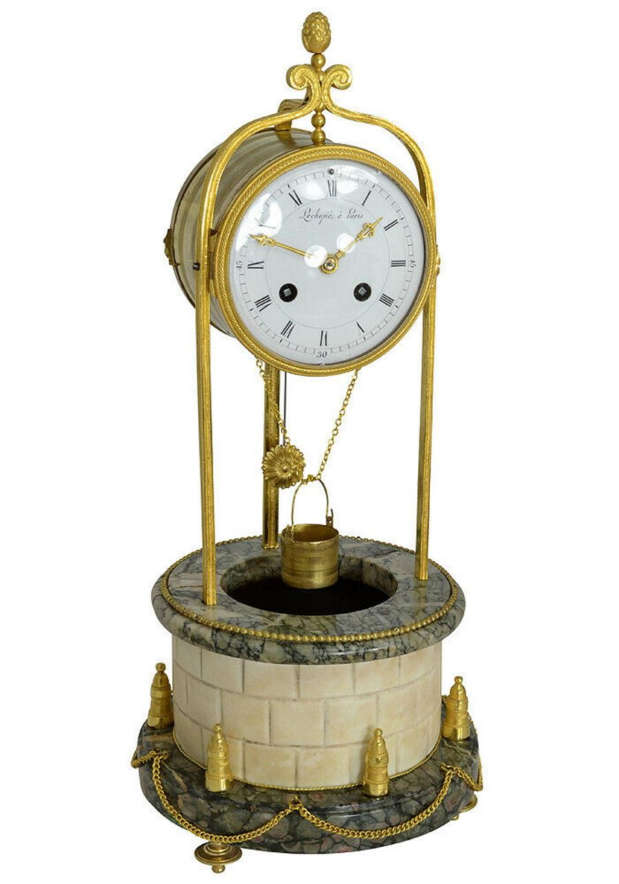 Rare mid-19th century well clock faithfully reproduced, signed on the enamel dial 