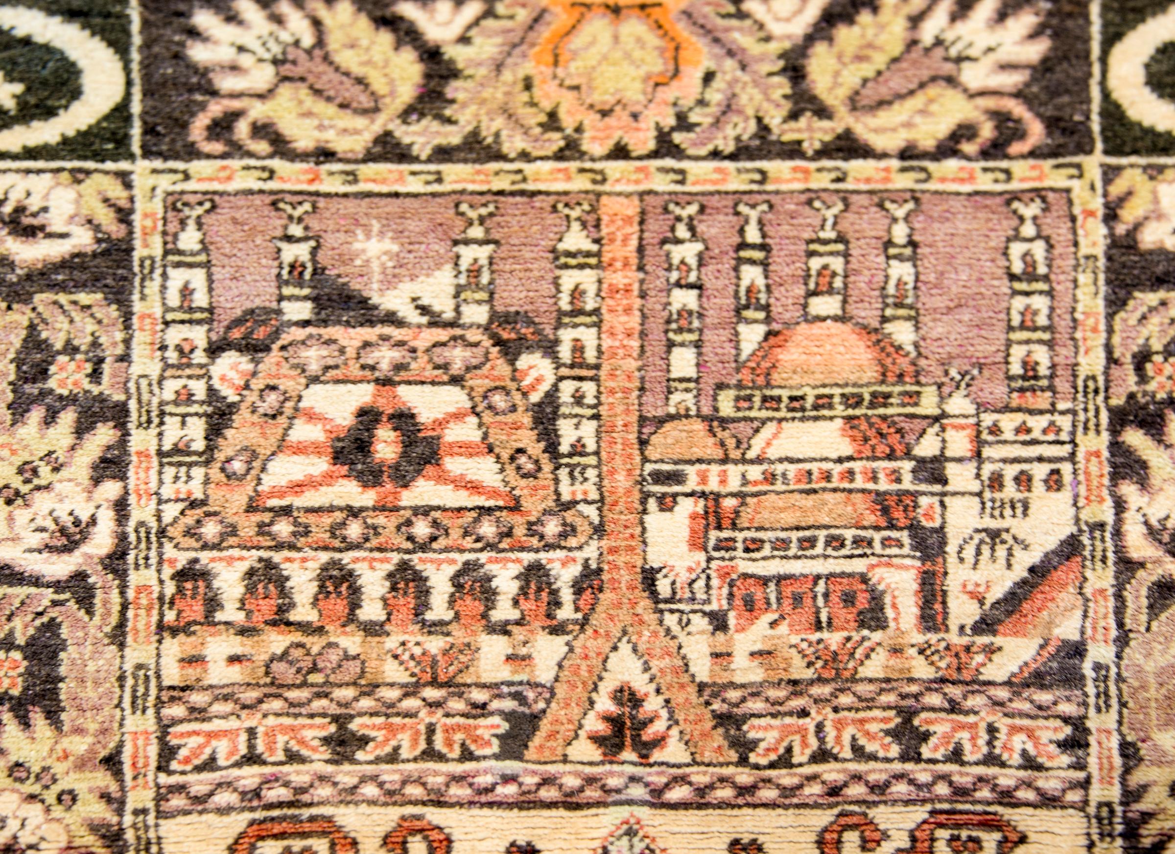 A rare and amazing mid-20th century Central Asian Samarghand pictorial prayer rug with two distinct scenes. The top shows the exterior of a mosque beautifully rendered in soft orange, purple, gold, and cream colored wool. The bottom scene depicts