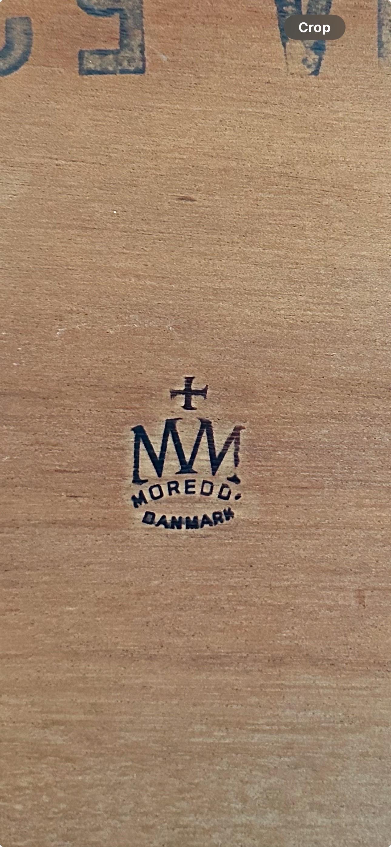 
Stunning midcentury modern design with by Moreddi Danmark. This side table with a drawer is sturdy and sleek with minimalist notes that are timeless. 
The table access a generous drawer providing storage with streamlined design.  Mid Century design