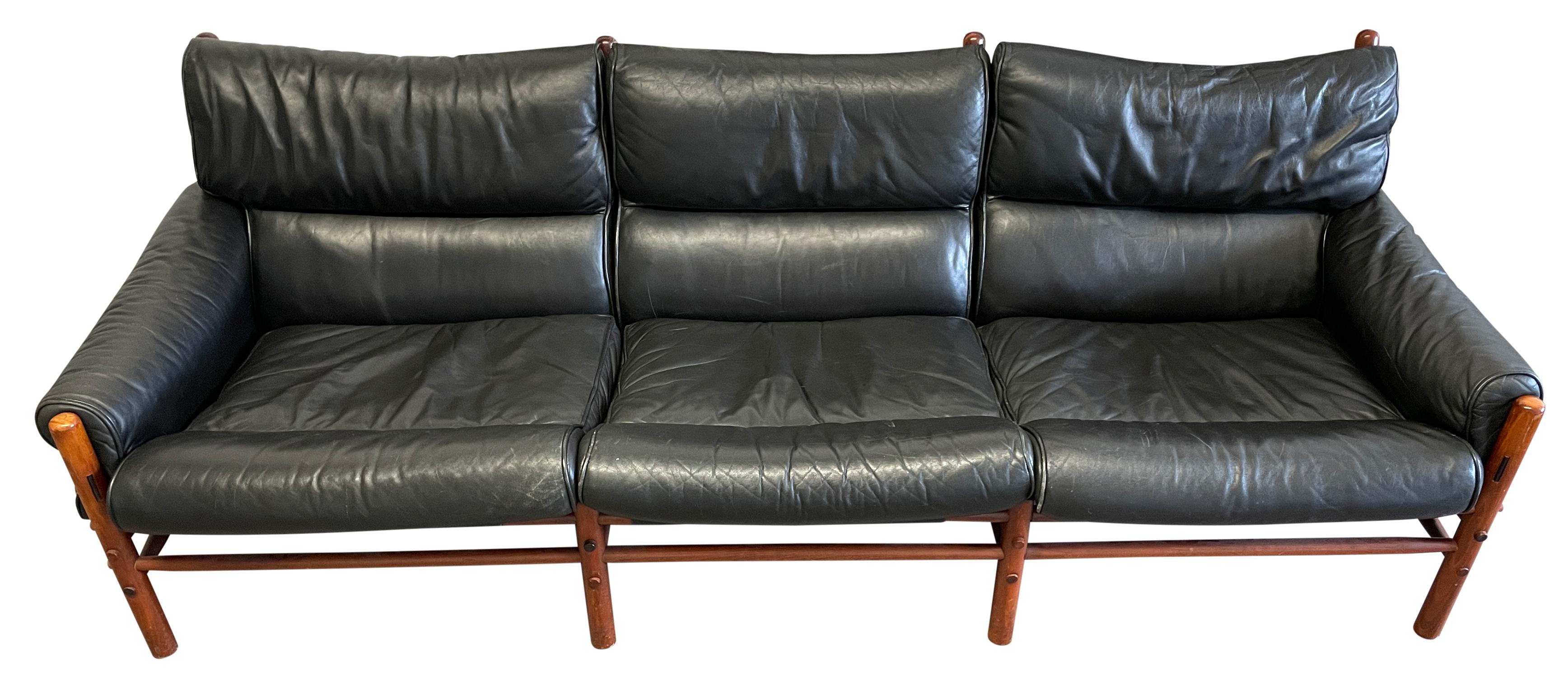 Arne Norell Kontiki sofa Swedish Design

Arne Norell (Sweden, 1917-1971). Mid-century modern Teak and soft black leather. Norell Sweden label. wear and creases to leather, wood with wear consistent with age. Beautiful Vintage Condition. Located in