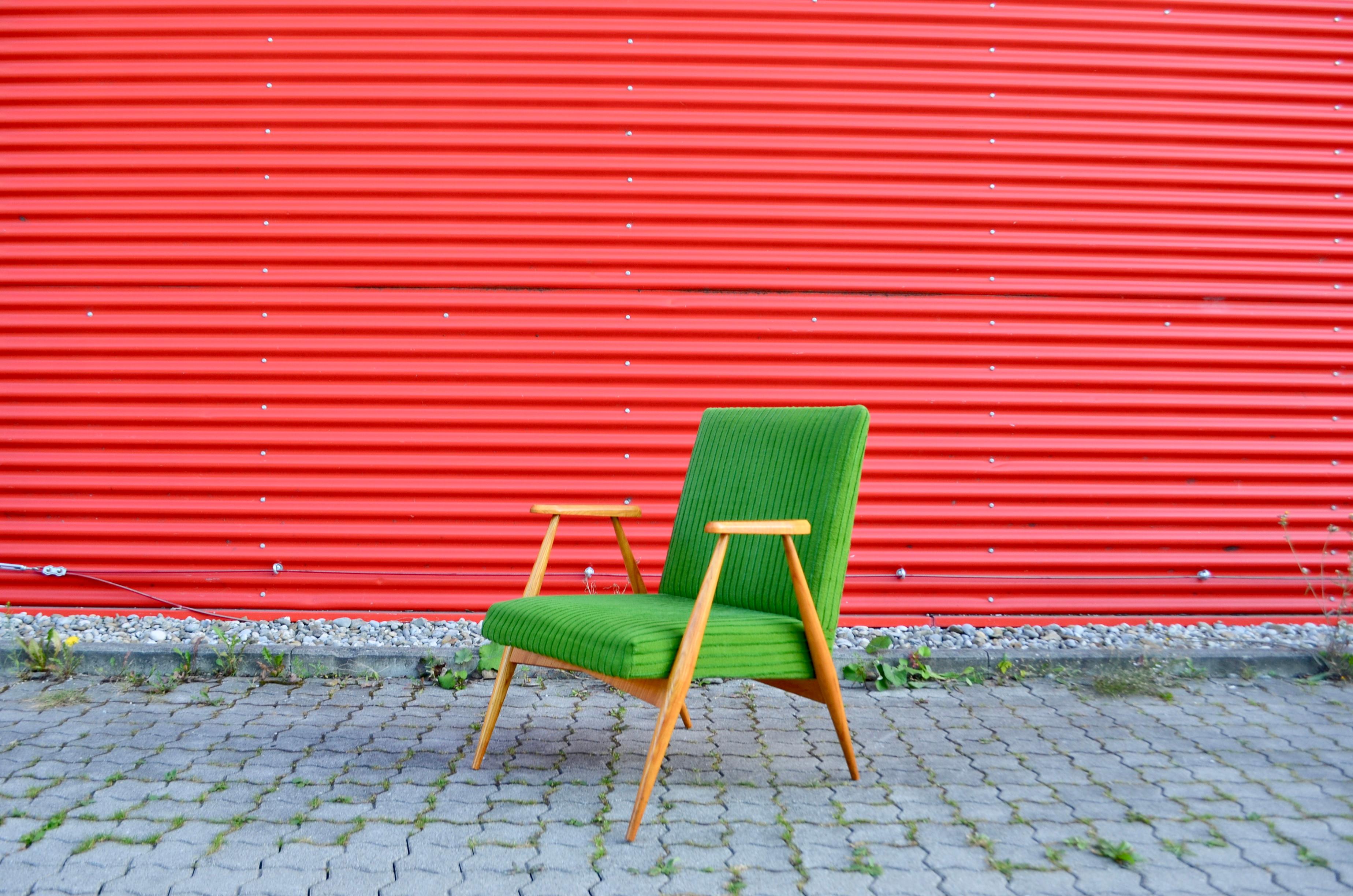 These rare and stunning Mid century Modern Easy chairs comes from Czech /Prague.
The designer and producer is still unknown.
The frame is made from elmwood and the sculptural armrests has references to the Czech Kubism.
As you can see that the thin