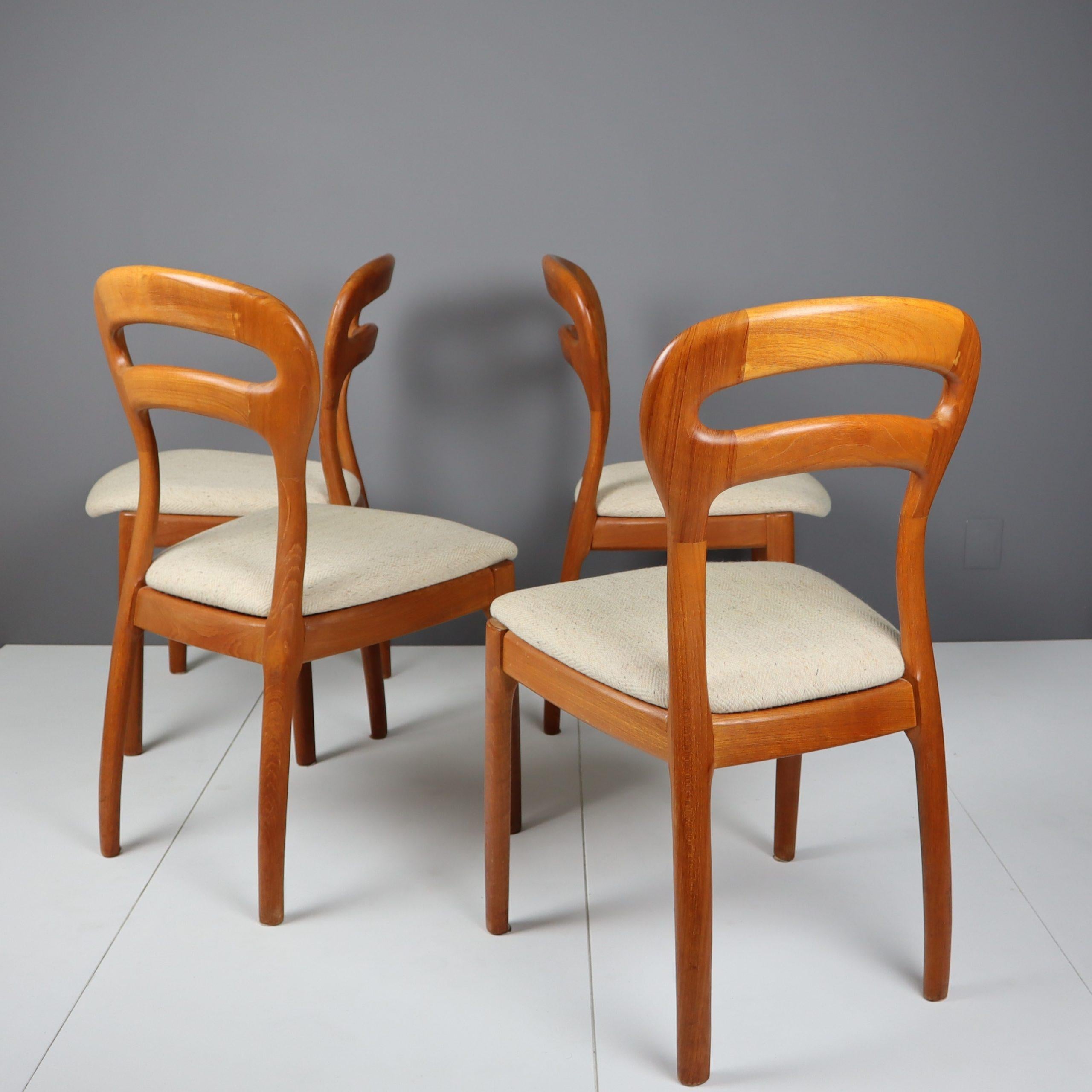 Four unusually-shaped Danish teak chairs. We have simply never come across these before. 

These chairs were bought at an auction in Germany in the fall of 2022. We fell in love with their spectacular shape, specifically the roundness of the