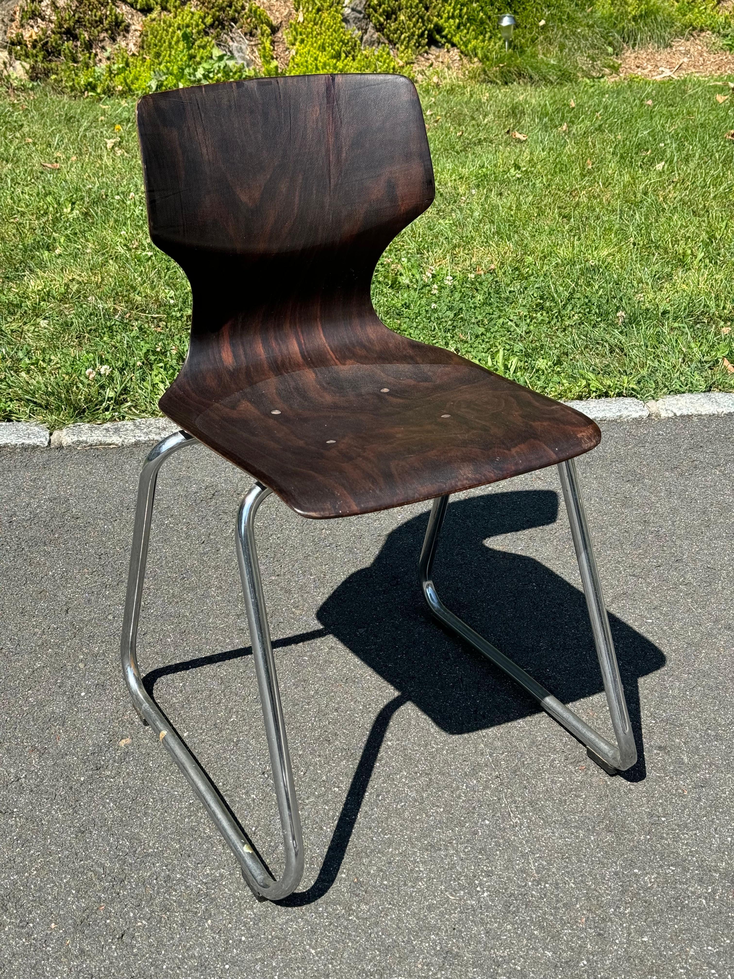 Rare Elmar Flototto Rosewood Side Chair. This bentwood chair is stamped and signed on the chair by Elmar Flototto and has a beautiful rosewood grain. Great as an accompaniment to any Mid-Century desk. This chair can easily be parcel shipped for $95