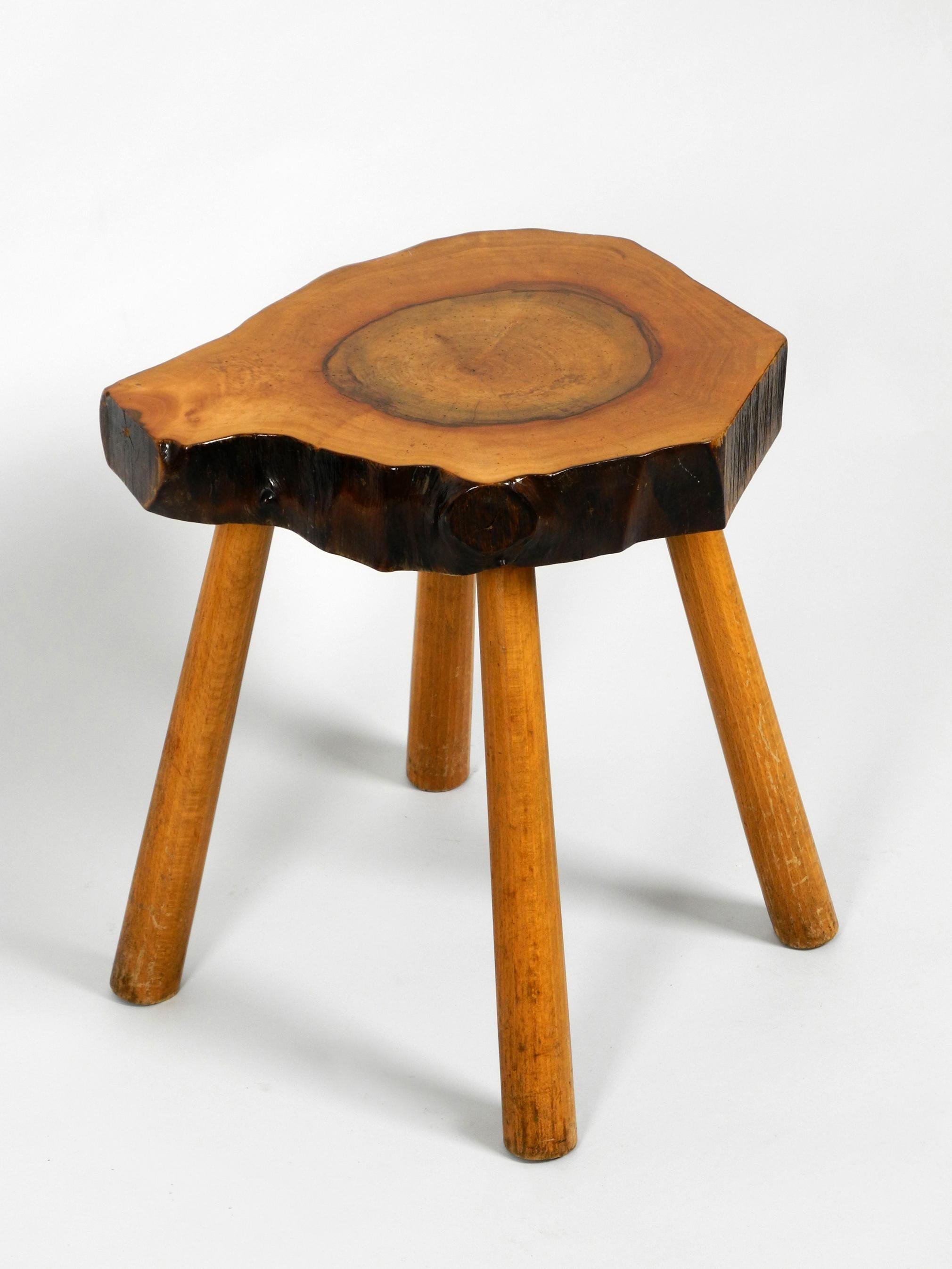 Mid-Century Modern Rare Midcentury Four-Legged Side Table Made of a Thick Tree Slice with Bark