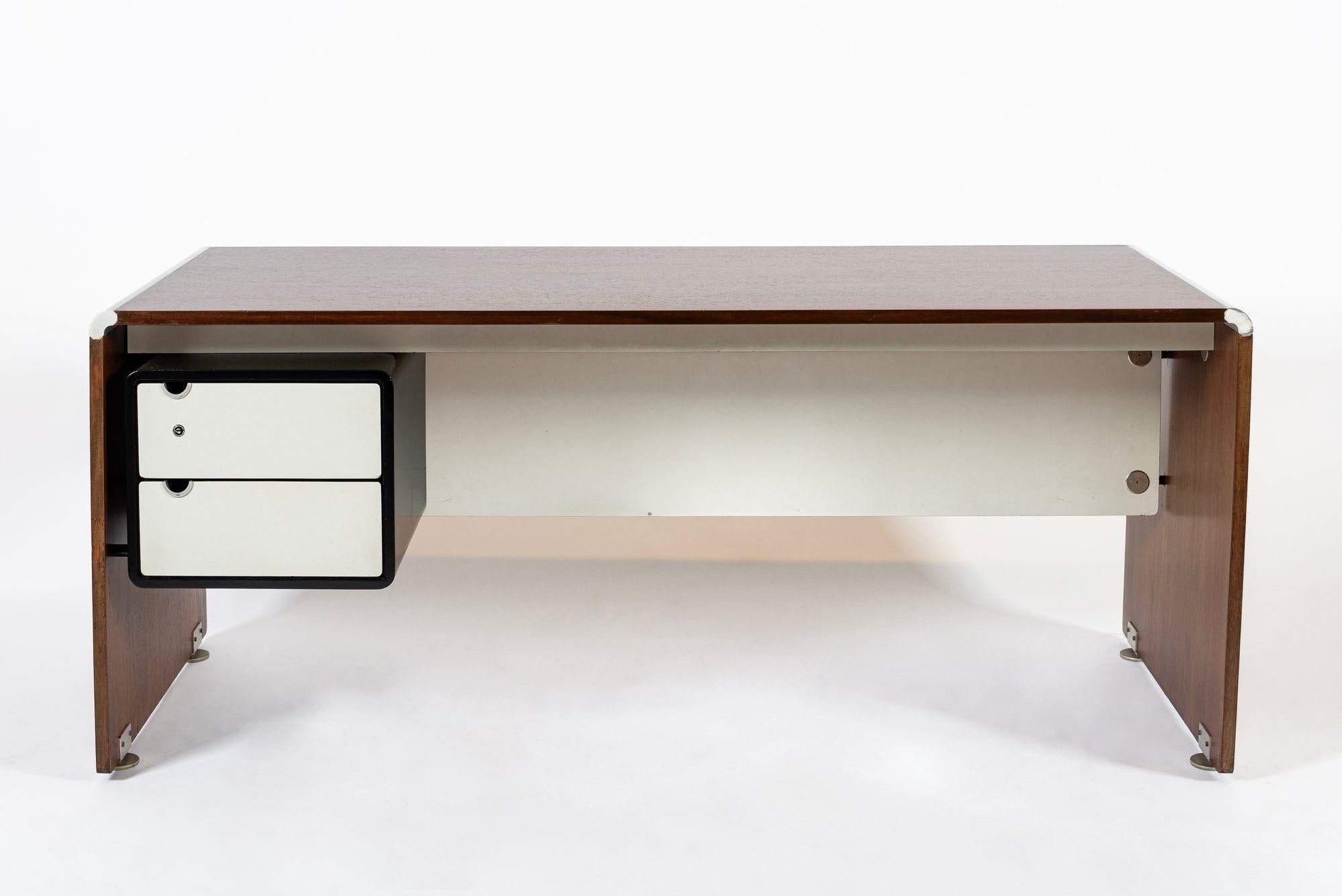 This rare & important vintage mid century French modern AR180 desk was designed by Alain Richard in collaboration with the A.R.C Mobilier National and produced by T.F.M circa 1970s. The desk is exceptionally well-crafted and features a sleek,