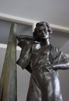 Rare Midcentury High Fashion Model Leaning Against a Bronze Tree Sculpture