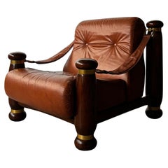 Rara poltrona di metà secolo in pelle e legno, Italia anni 
70