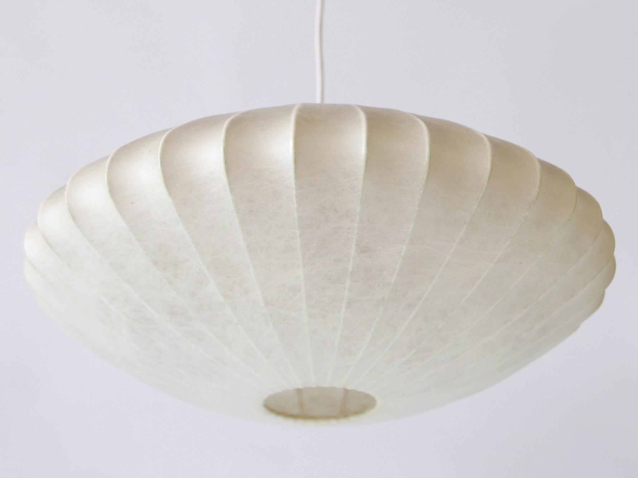 Large, rare and highly decorative Mid-Century Modern cocoon pendant lamp or hanging light. Designed & manufactured probably by Goldkant Leuchten, Germany, 1960s.

Executed in sprayed latex material and metal, the pendant lamp needs 1 x E27 / E26