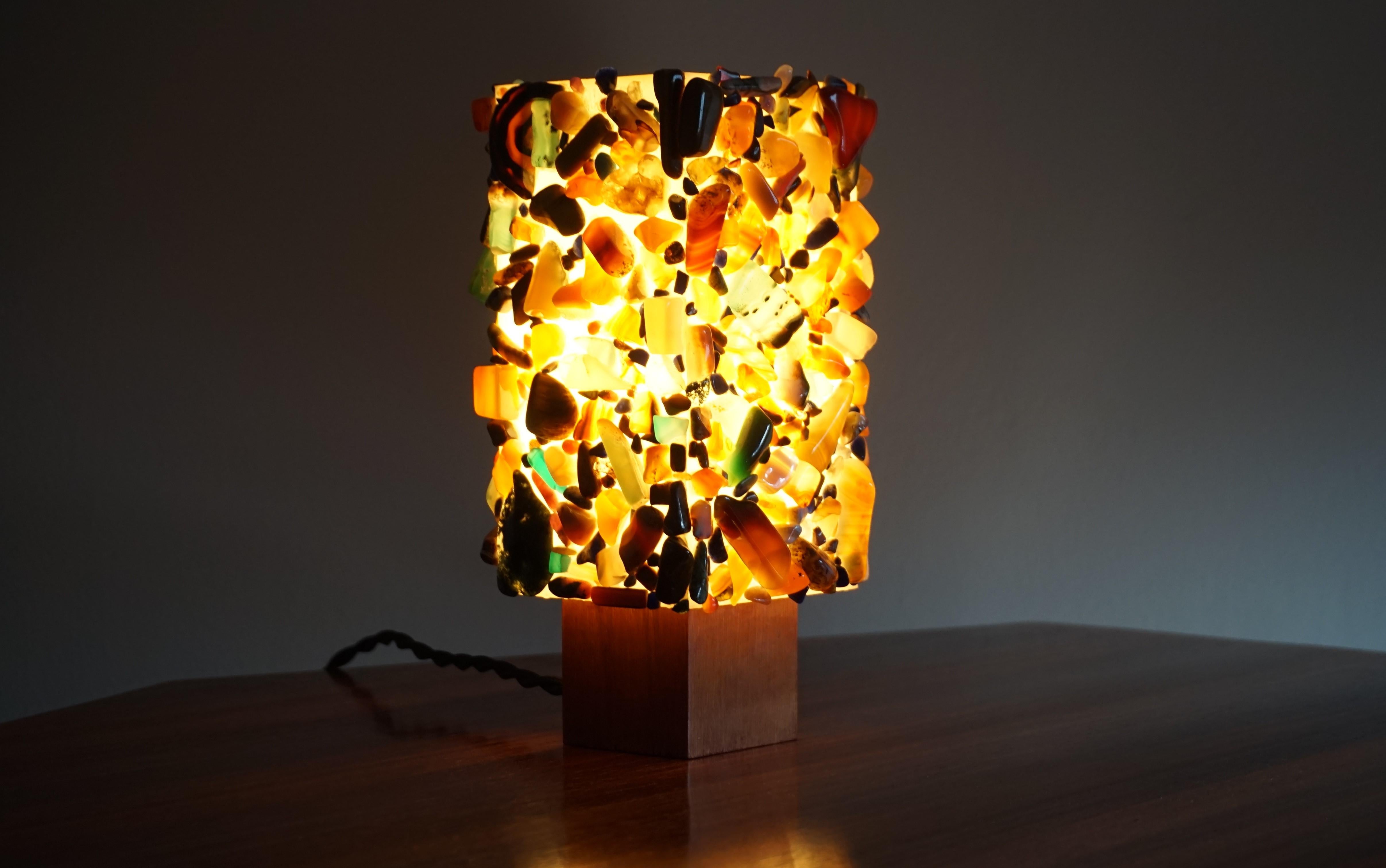 Unique, vibrant and superb condition, 1960s table lamp with marvelous colors.

Both with the light switched on and off, this colorful and highly stylish midcentury table lamp is an absolute joy to own and look at. All handcrafted with the use of