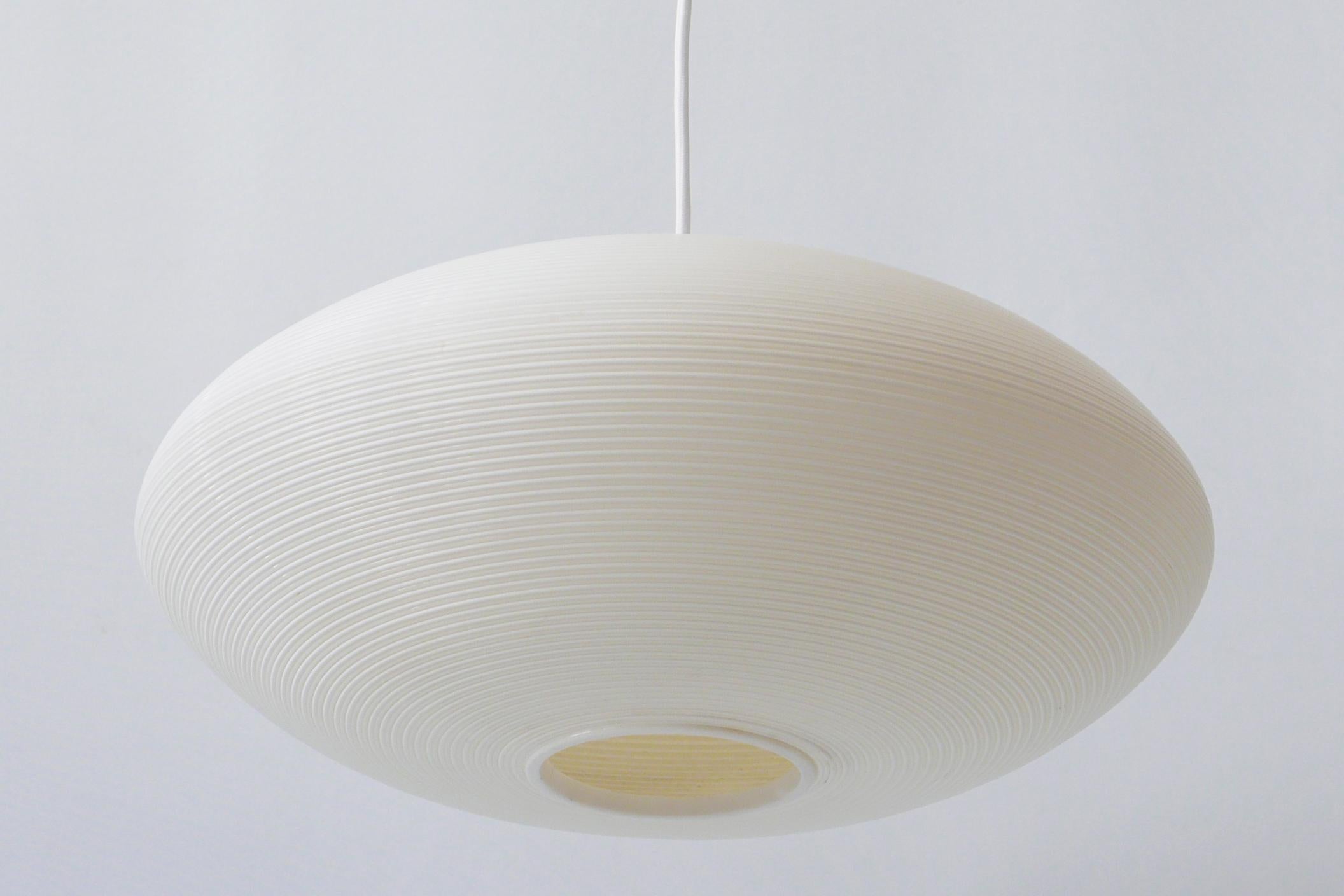 Lovely Mid-Century Modern pendant lamp or hanging light. Designed Yasha Heifetz for Rotaflex Heifetz, 1960s, USA.

Executed in spun plastic, it comes with 1 x E27 Edison screw fit bulb holder, is rewired and in working condition. It runs both on