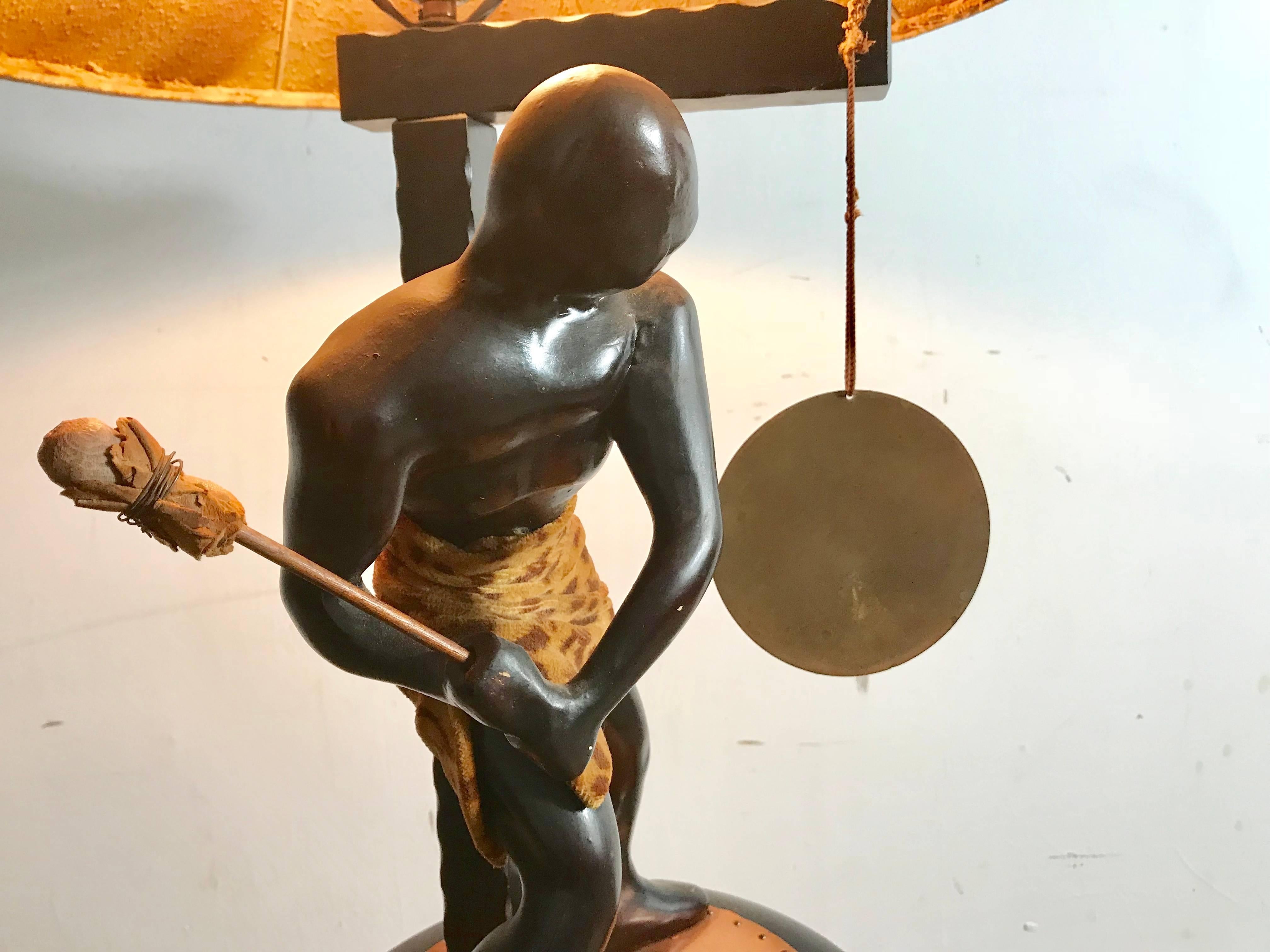 Rare Mid-Century Modern Table Lamp, Nubian Man Hitting Gong, Moss Lamp Co In Good Condition For Sale In Buffalo, NY