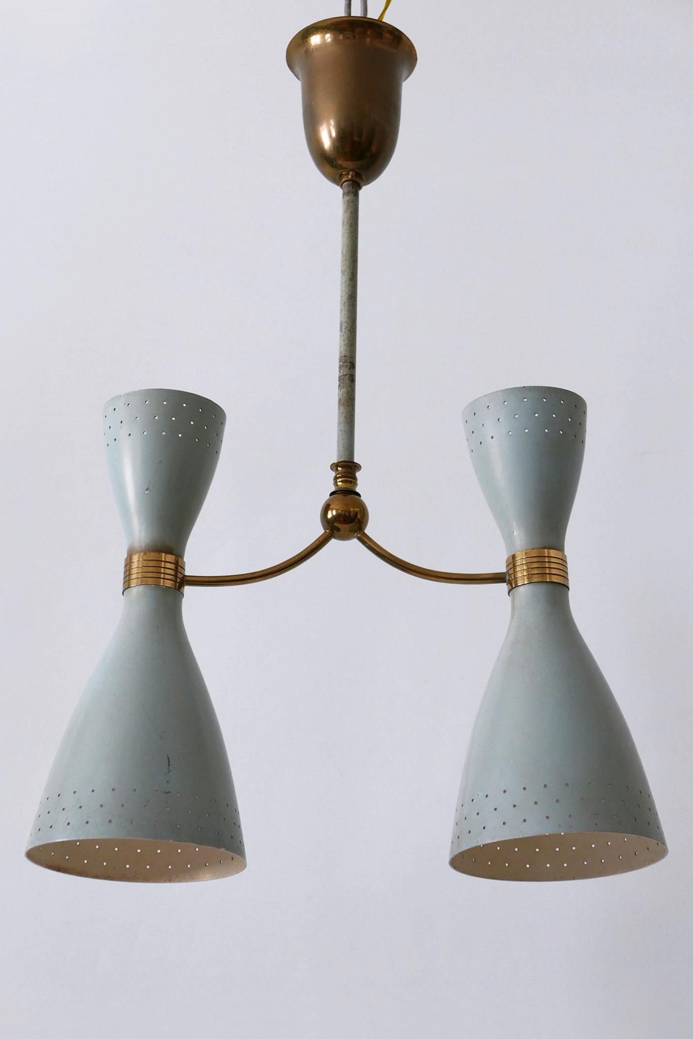 Rare, elegant and highly decorative Mid-Century Modern two armed and four flamed diabolo pendant lamp or chandelier in pastel blue color. Up and down lighter. Designed & manufactured probably in Italy, 1950s.

Executed in perforated aluminum, metal
