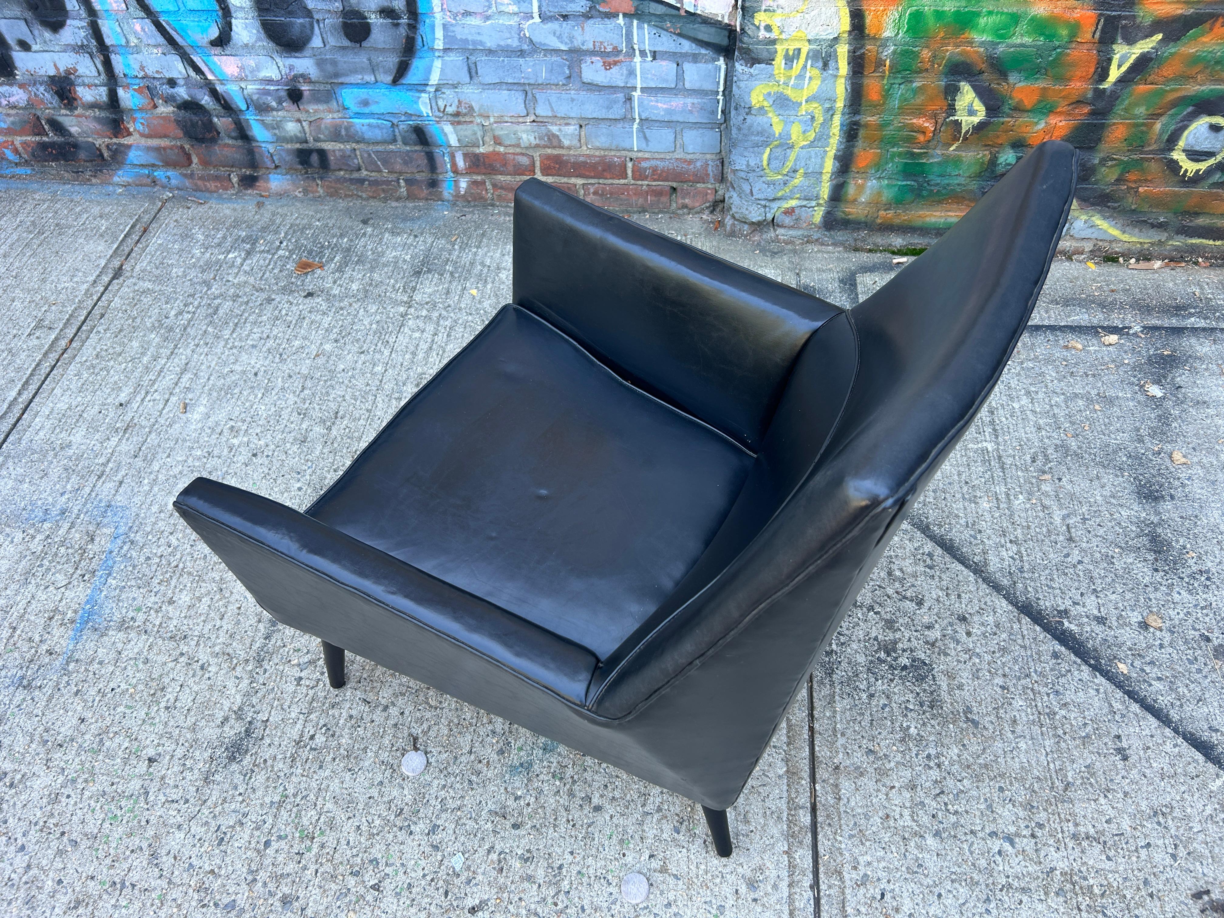 Naugahyde Rare mid century Paul Mccobb all Black original Squirm lounge chair  For Sale