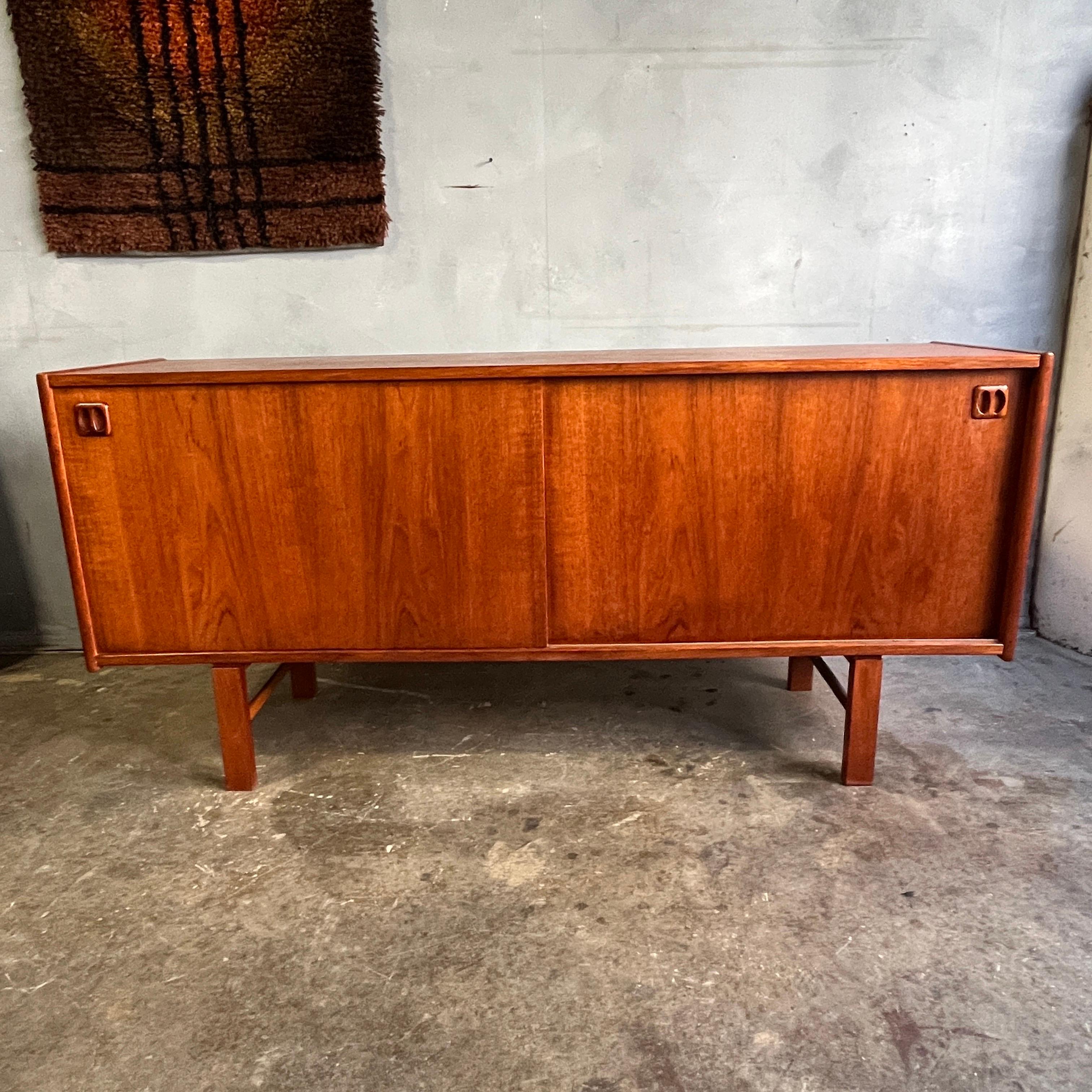 Rare Scandinavian Danish Modern sideboard in Teak wood designed by Erik Worts for Ikea 1960's. One of the most soft after designers and somewhat elusive as Erik Worts only designed a few pieces for IKEA and very few of these credenzas were ever