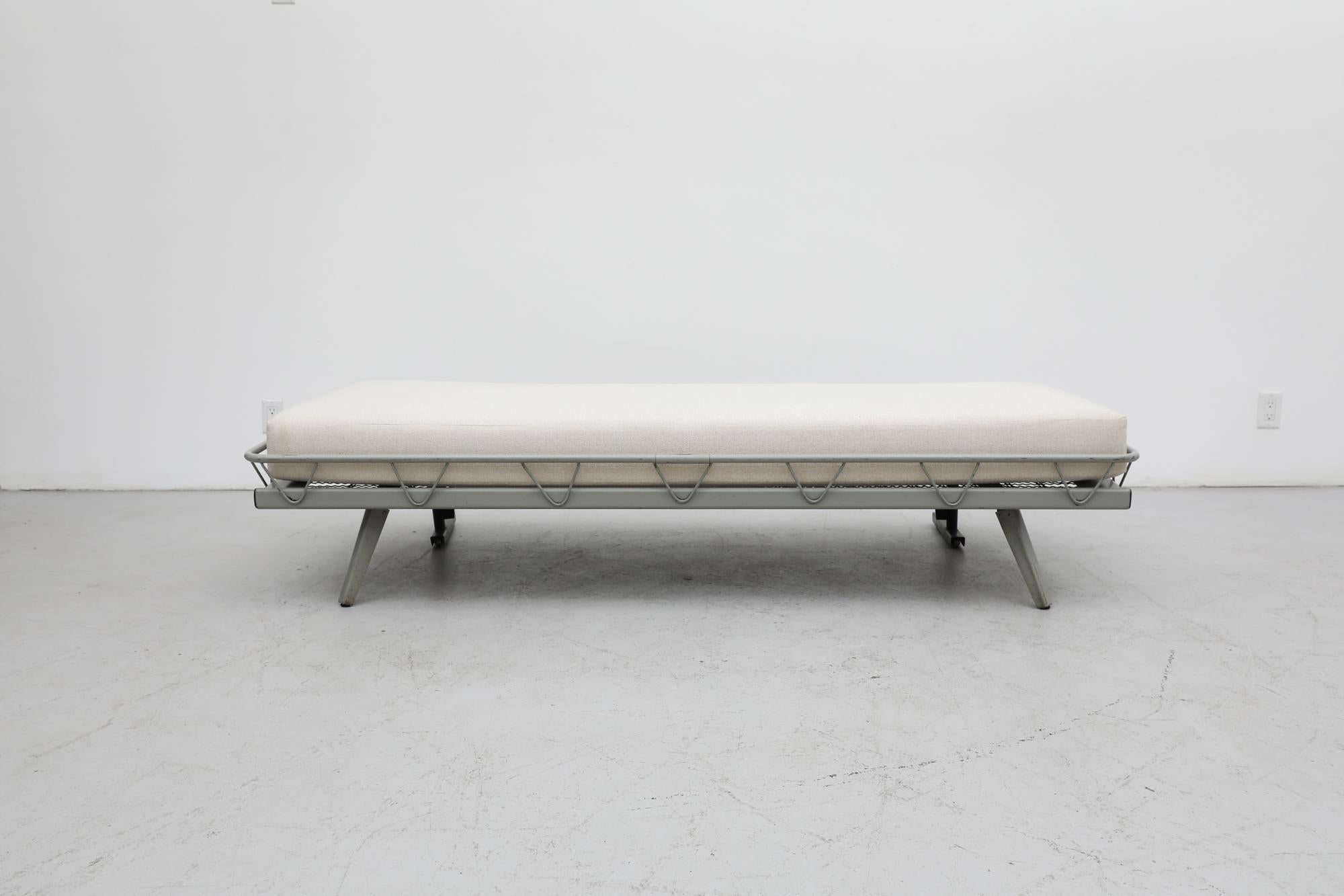 Rare fold-up Arielle daybed by Wim Rietveld for Auping, 1953. The Arielle arrived shortly after Rietveld's 