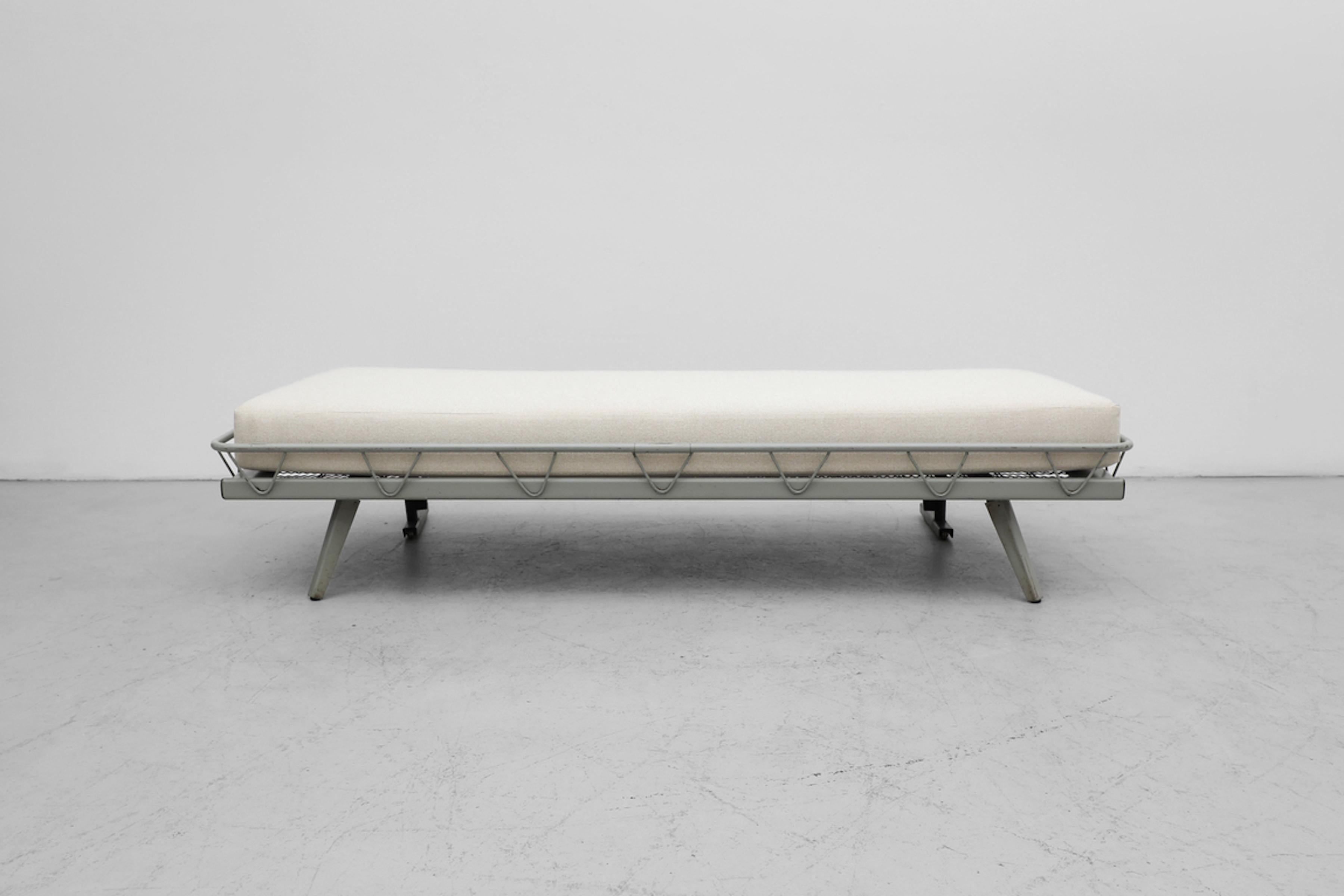 Rare fold-up Arielle daybed by Wim Rietveld for Auping, 1953. The Arielle arrived shortly after Rietveld's 