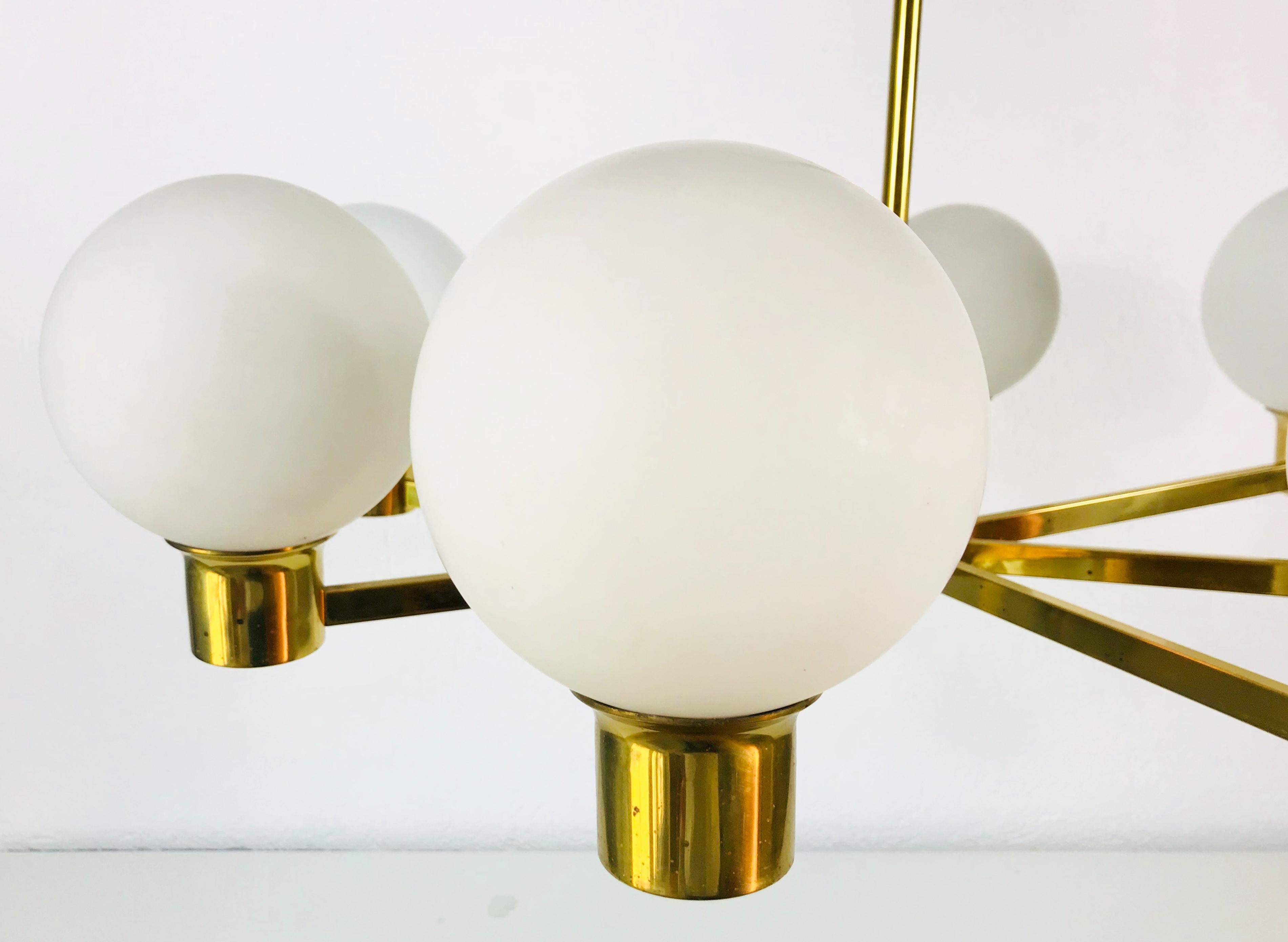 Mid-20th Century Rare Midcentury 8-Arm Brass and Opaline Glass Chandelier, 1960s For Sale