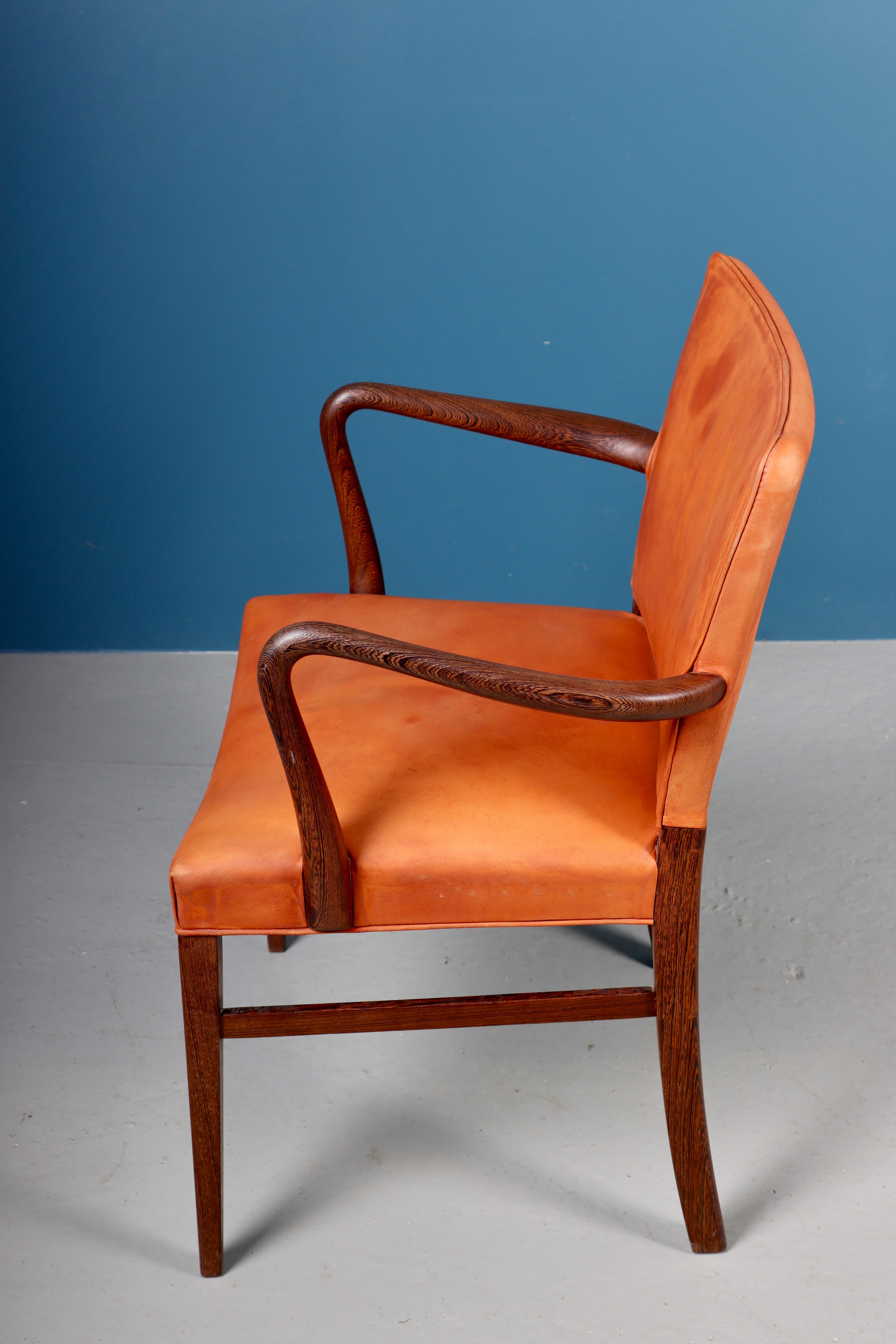 Scandinavian Rare Midcentury Armchair in Patinated Leather and Wenge, Danish Design, 1950s For Sale