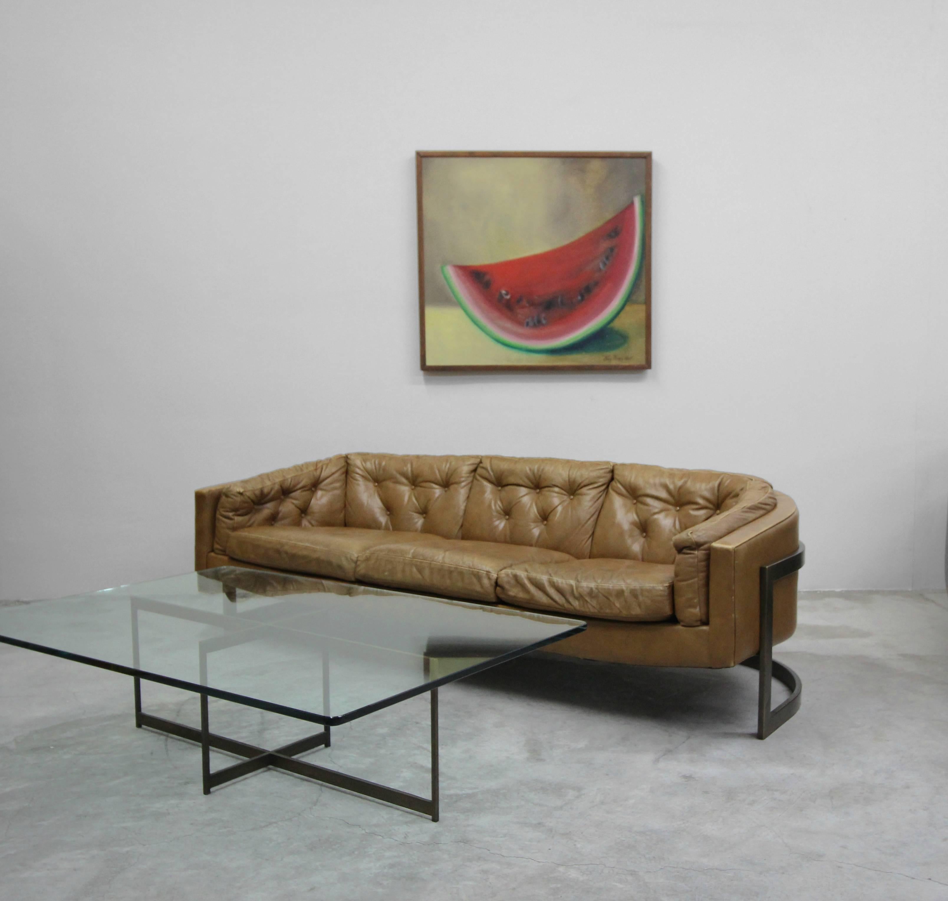 You don't see one of these every day, or ever for the matter. A rare Milo Baughman for Thayer Coggin barrel sofa with the rarest of rare cantilevered bronze frame. As if the bronze frame wasn't enough, it is still handsomely dressed in it's all