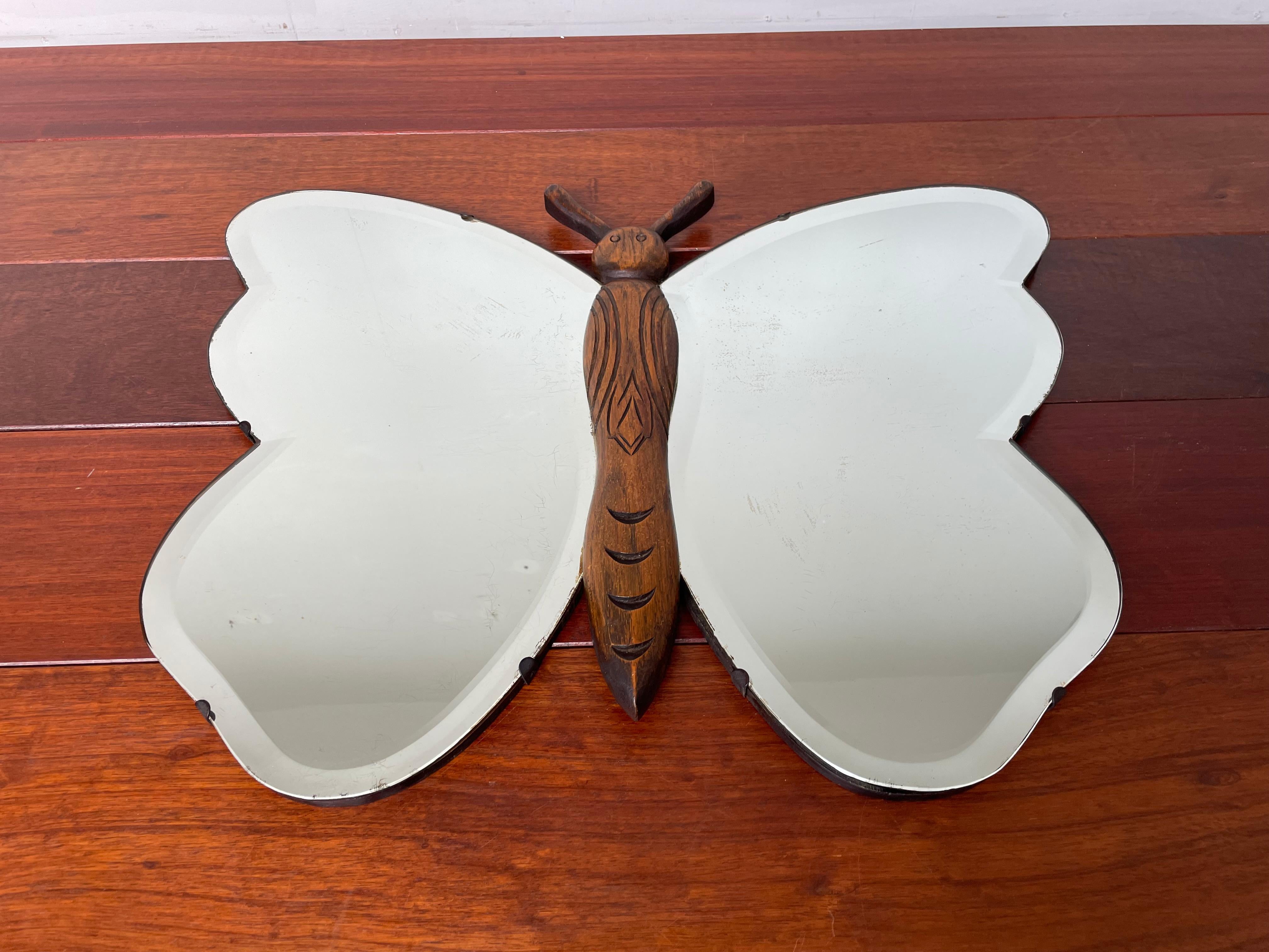 Striking butterfly wall mirror, with an oak body and beveled glass wings.

If you love butterflies and/or if they are meaningful in your life then this wonderful wall mirror could be flying your way soon (lots of pun intended). Because of their