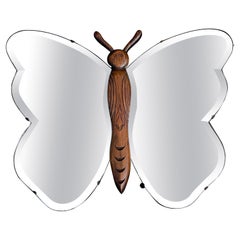 Rare miroir mural en bois de chêne et verre biseauté, design papillon, de fabrication du milieu du siècle dernier