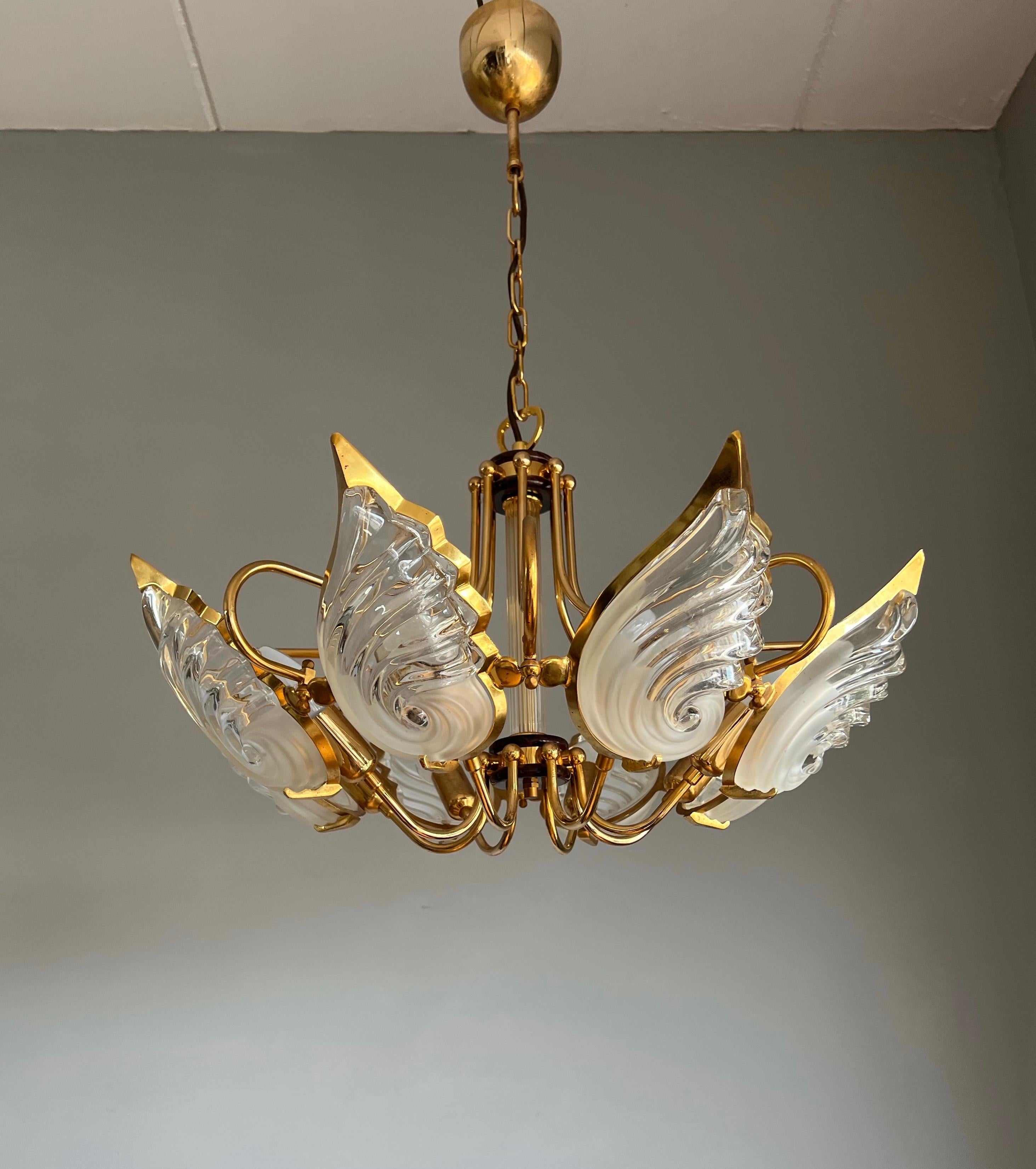 Sculptural and highly decorative eight light fixture.

This wonderful work of lighting art is another one of our recent great finds and it is typical for Southern European midcentury design. However, the fact that works of art like this bring