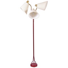 Rare Midcentury Oxblood Red Enamelled Iron and Brass Three Light Floor Lamp